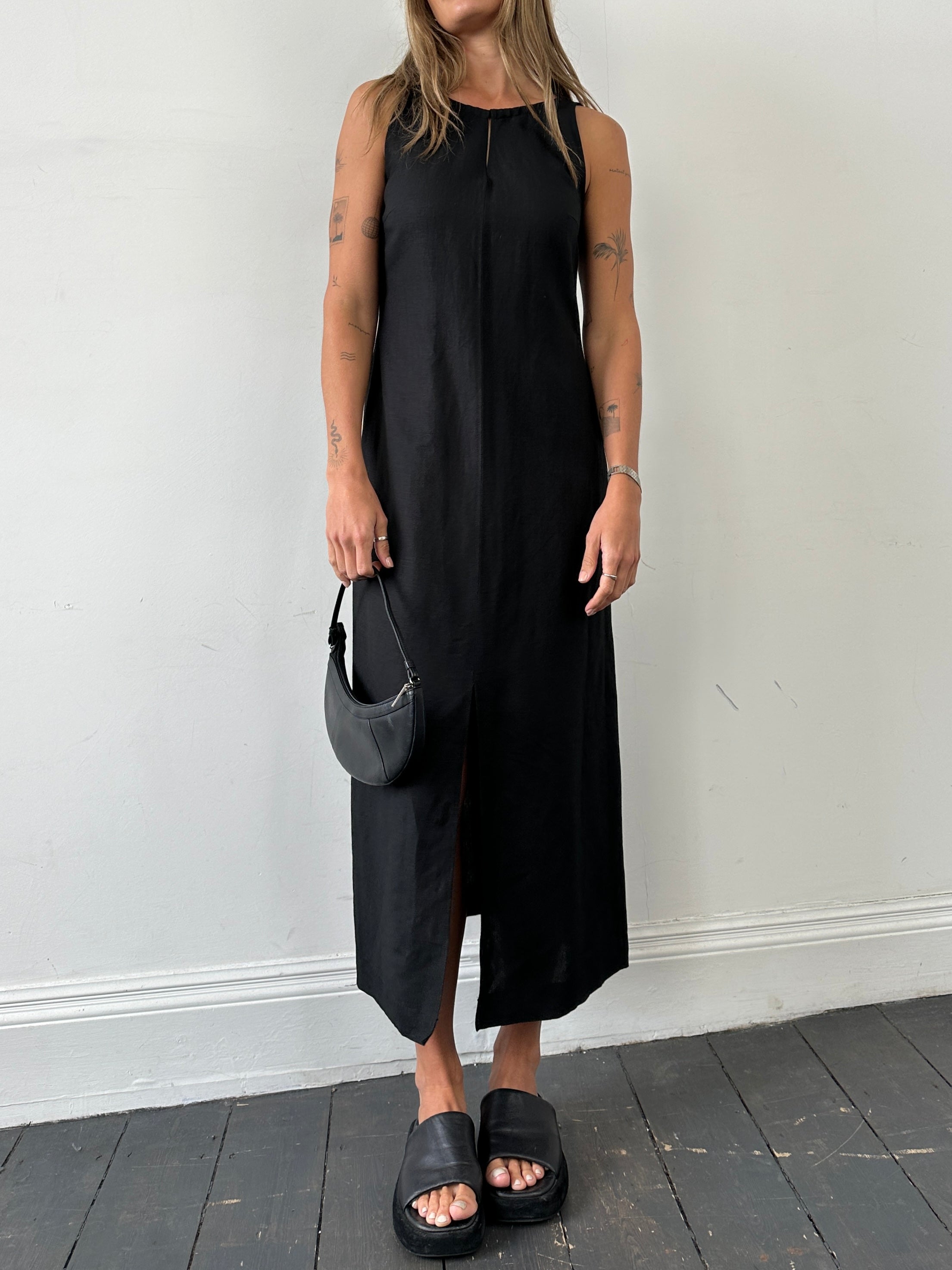 Marella linen floor-length dress in size M, featuring a flowing design and elegant style, displayed on a hanger.