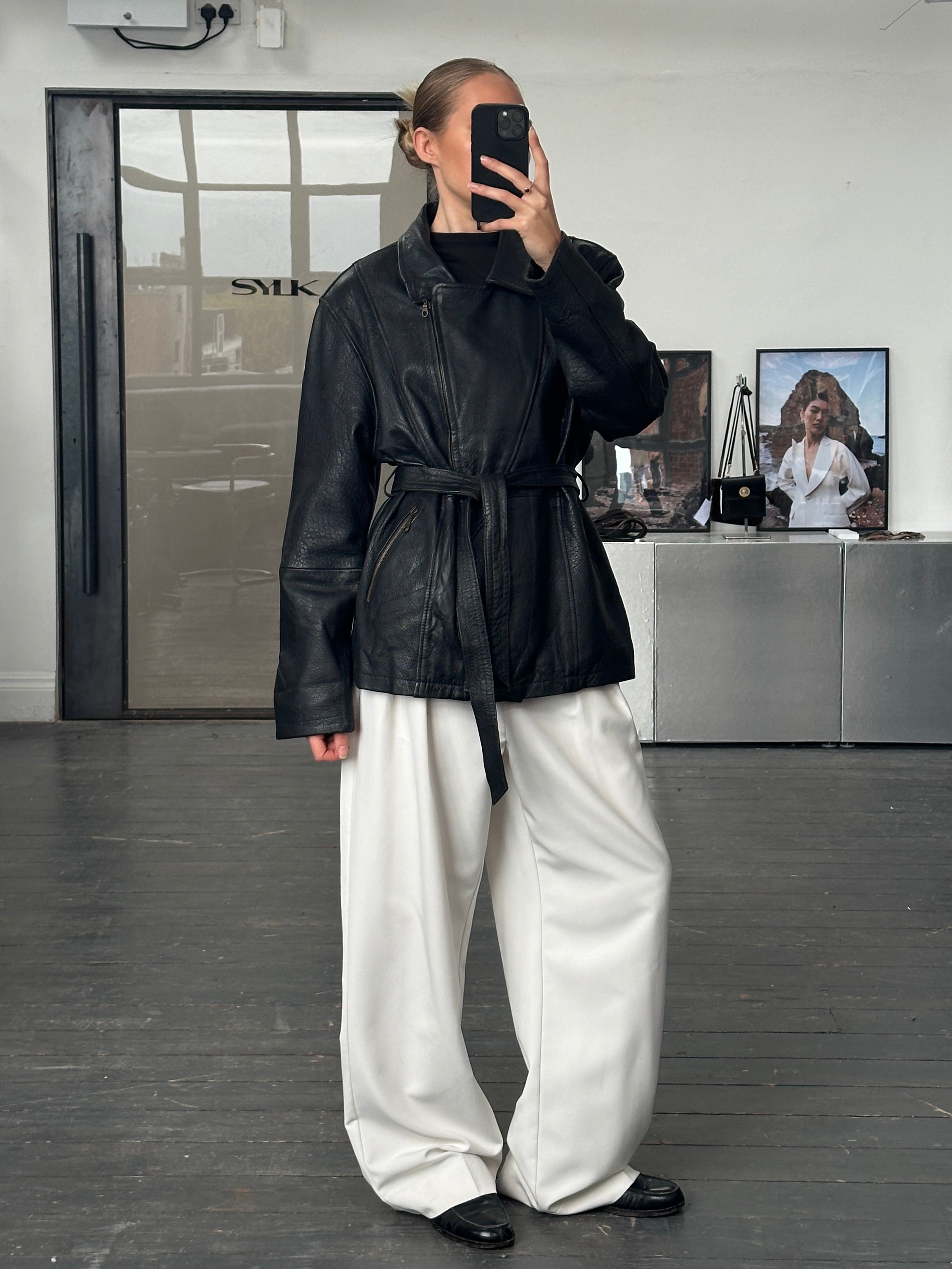 Vintage 1990s lamb leather belted jacket in XL, featuring classic style and authentic leather texture.