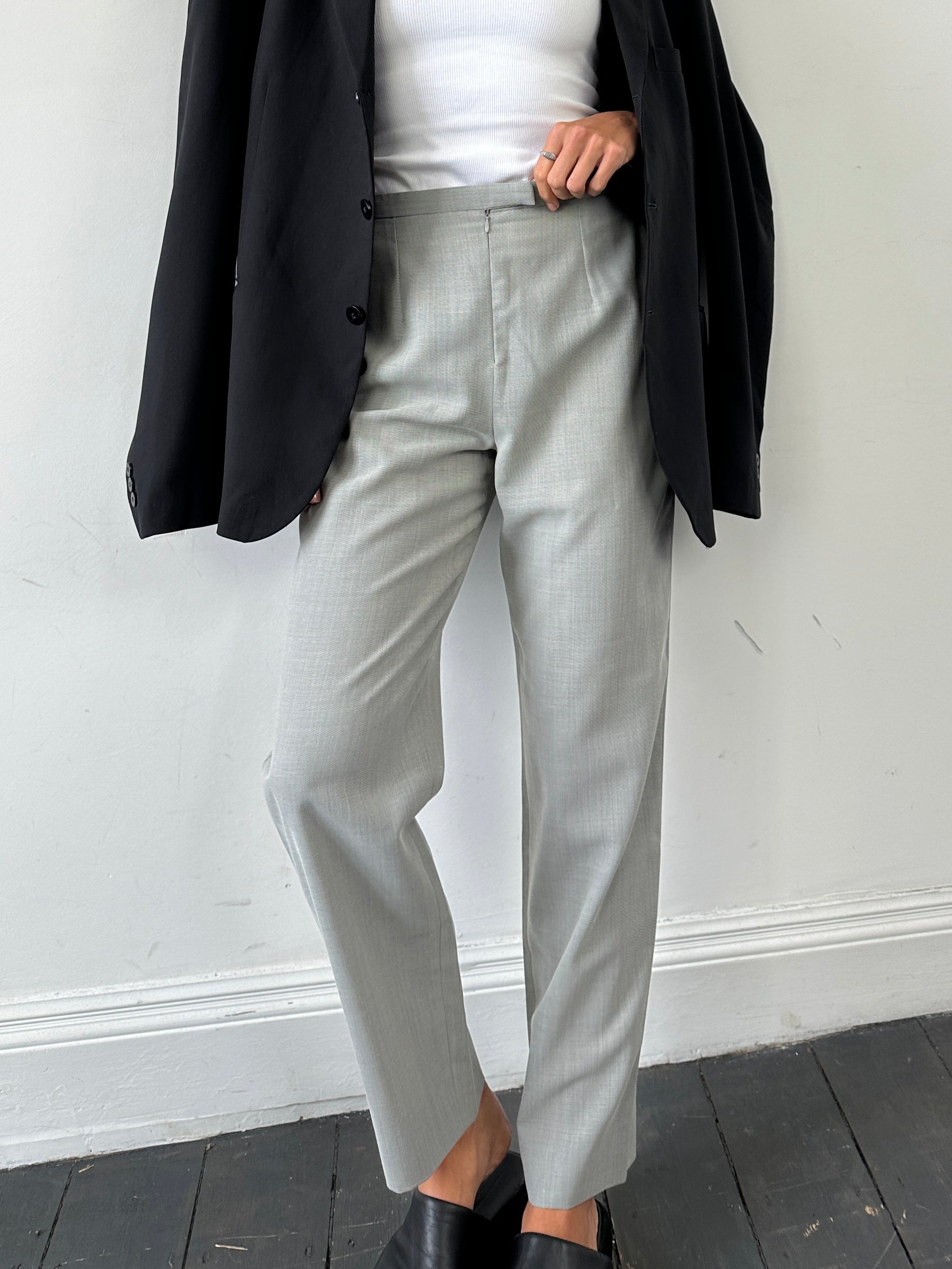 Marella wool blend high-waisted tapered leg trousers in dark fabric, size W28, with tailored fit and front pockets.