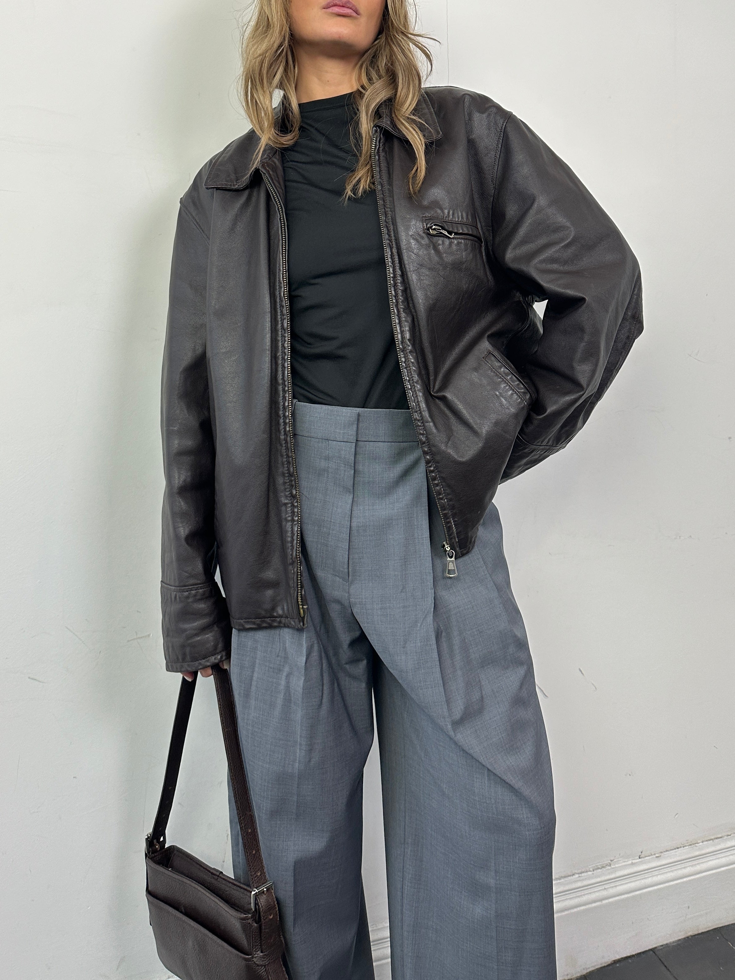 Italian Vintage Leather Jacket in size L/XL, stylish distressed leather with classic design and antique finish.