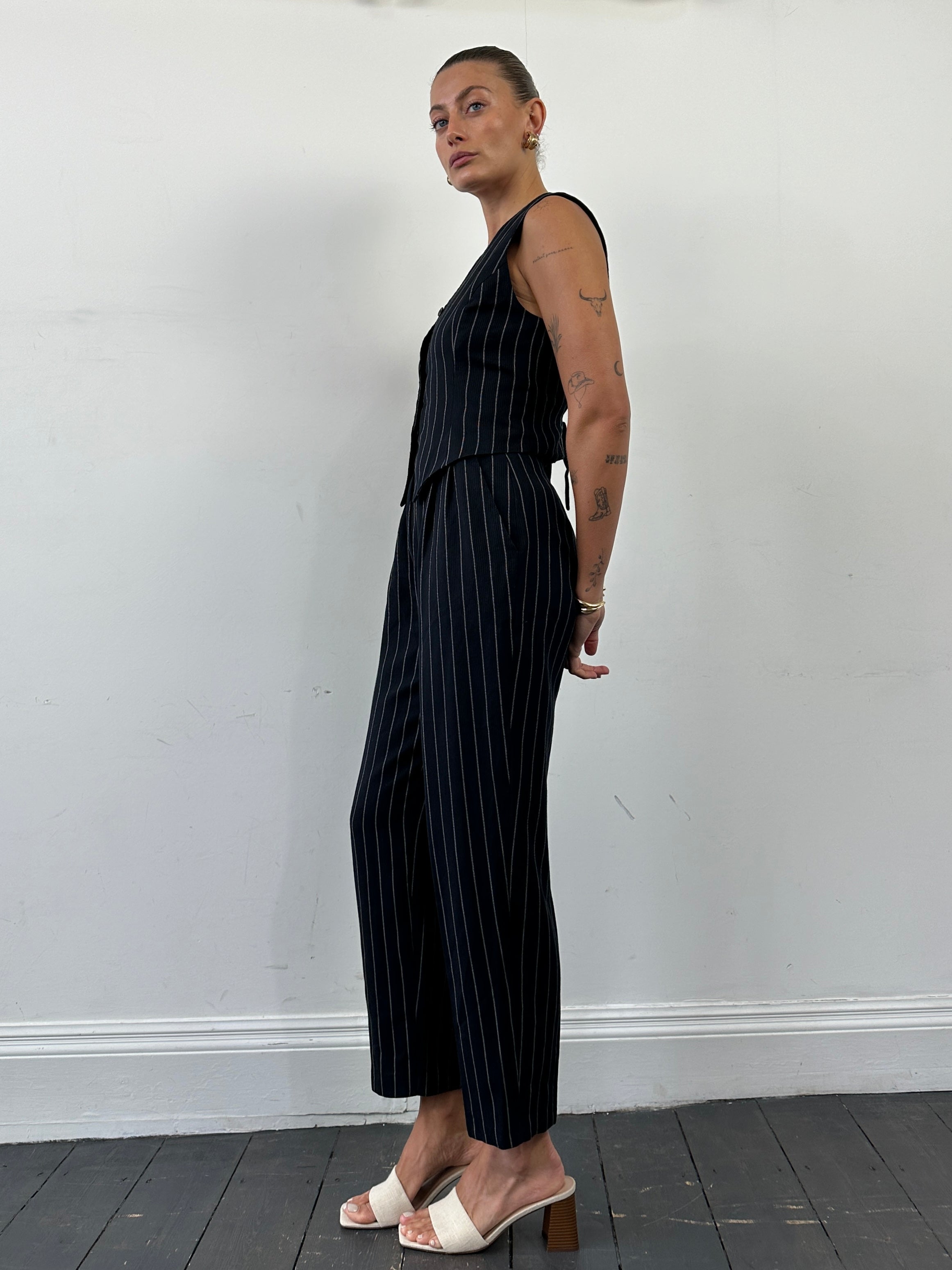 Vintage British vintage pinstripe two-piece waistcoat and trousers set, front view showing classic tailored design and modern fit.