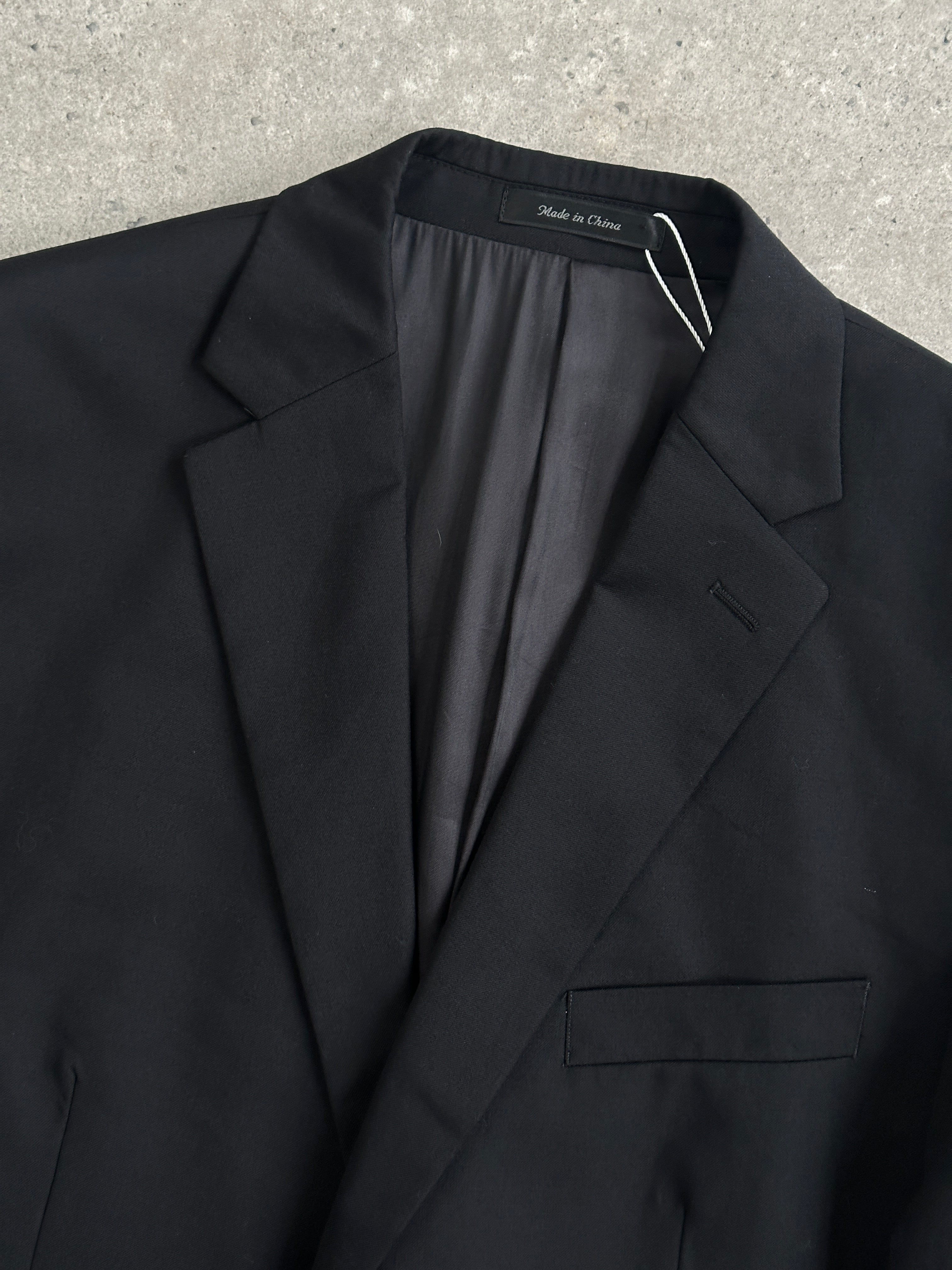 Ralph Lauren pure wool single-breasted blazer in size 42R/XL, tailored fit with classic lapel and button closure.