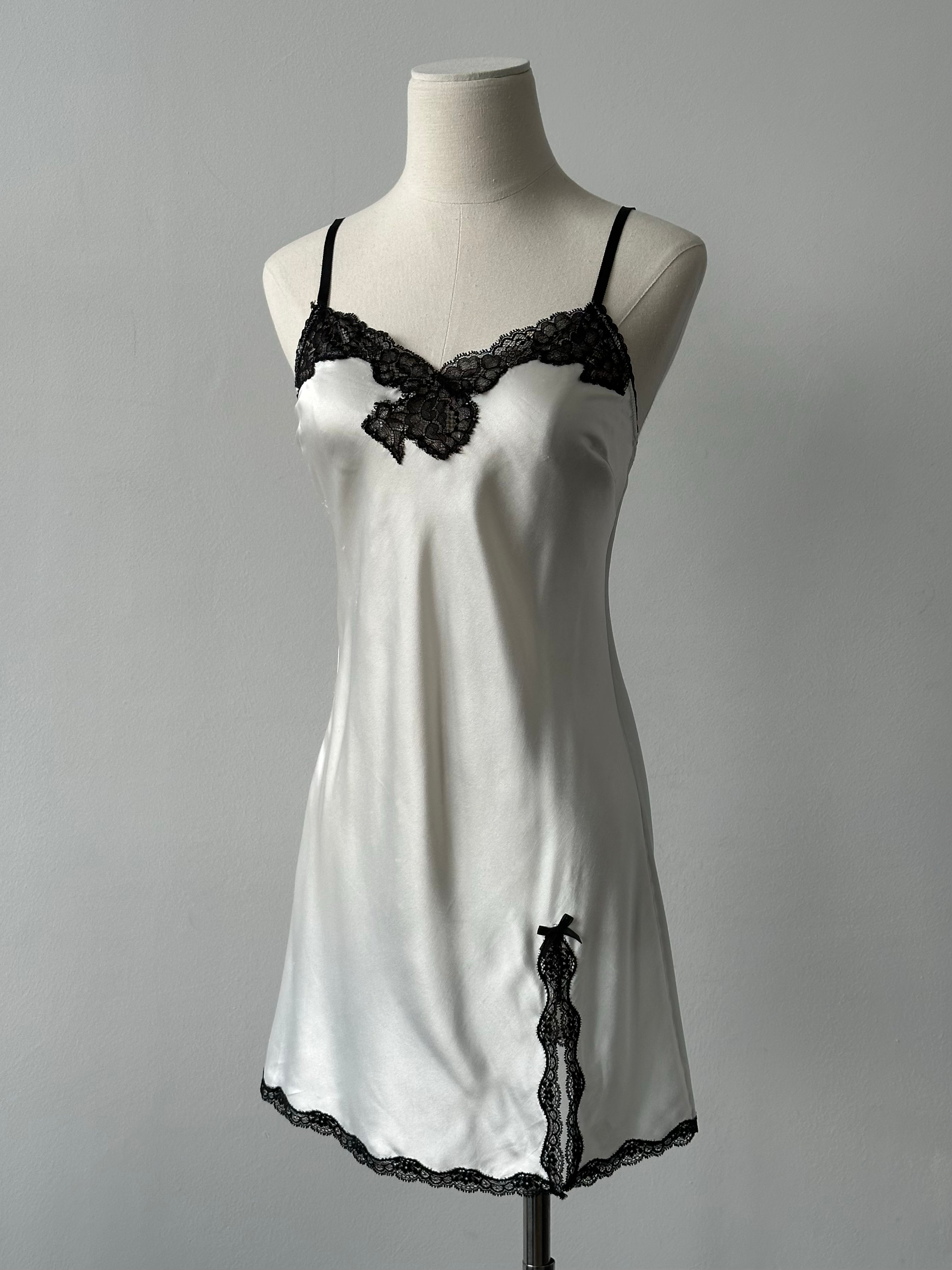 Victoria's Secret 2000s satin lace mini slip dress in XS/S, featuring smooth satin fabric and delicate lace trim.
