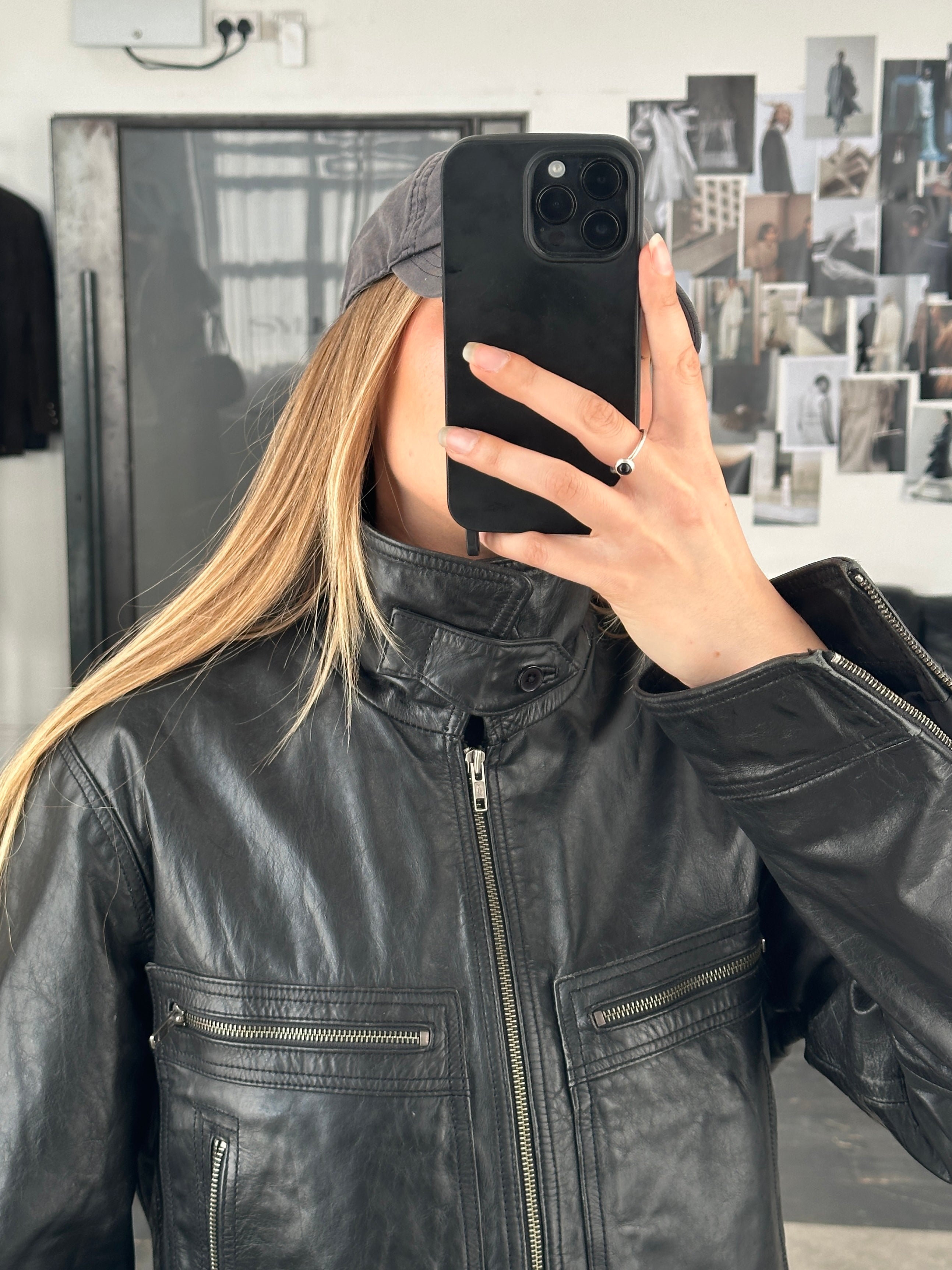 Conbipel high neck leather jacket in black, stylish men's leather jacket with a high neckline and sleek design.