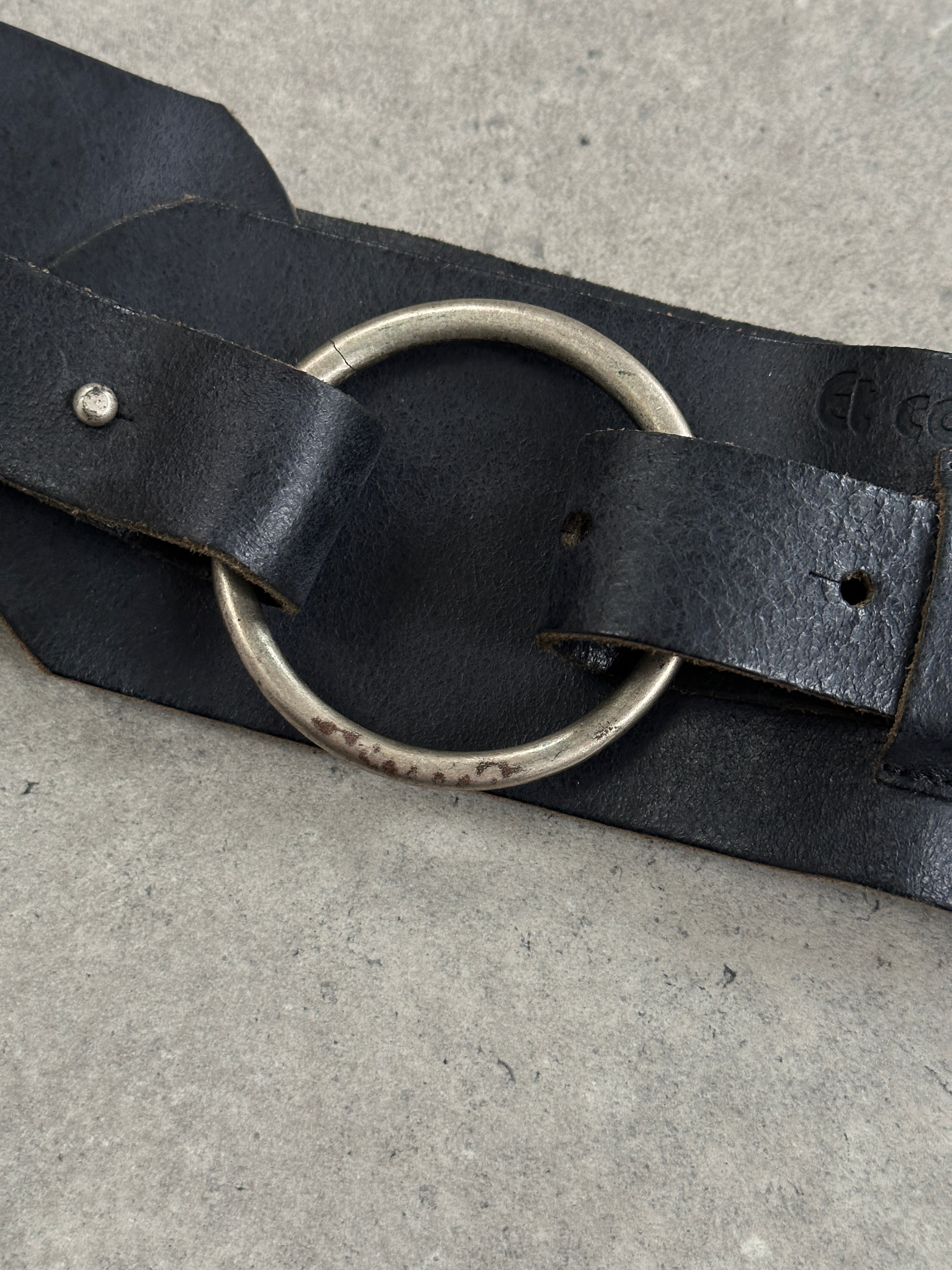 Vintage French 1990s chunky studded leather belt with adjustable W32-36, featuring bold metal studs and a classic vintage style.