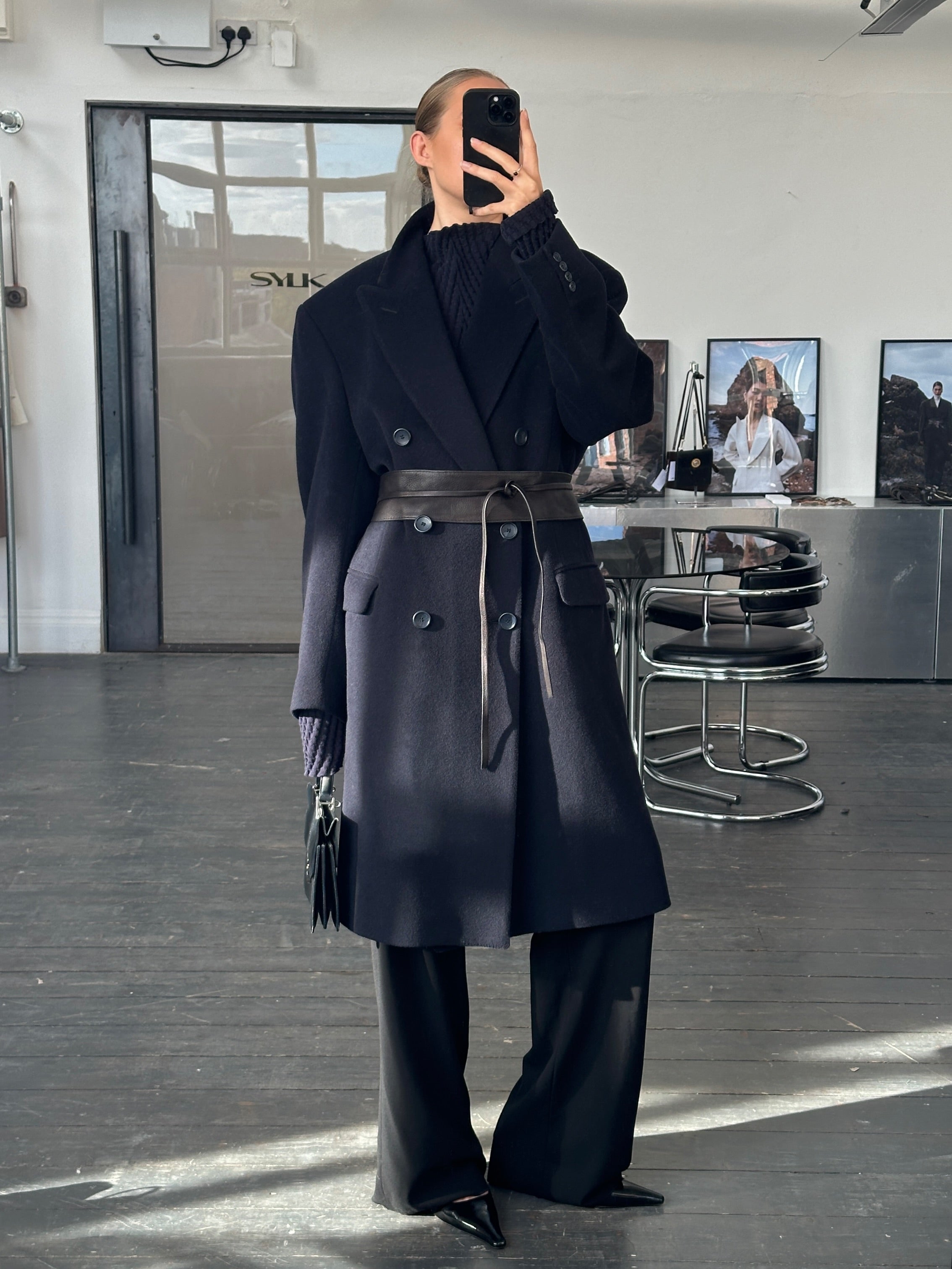 Vintage British 1990s wool and cashmere double-breasted coat in XL, showcasing classic design and textured fabric.