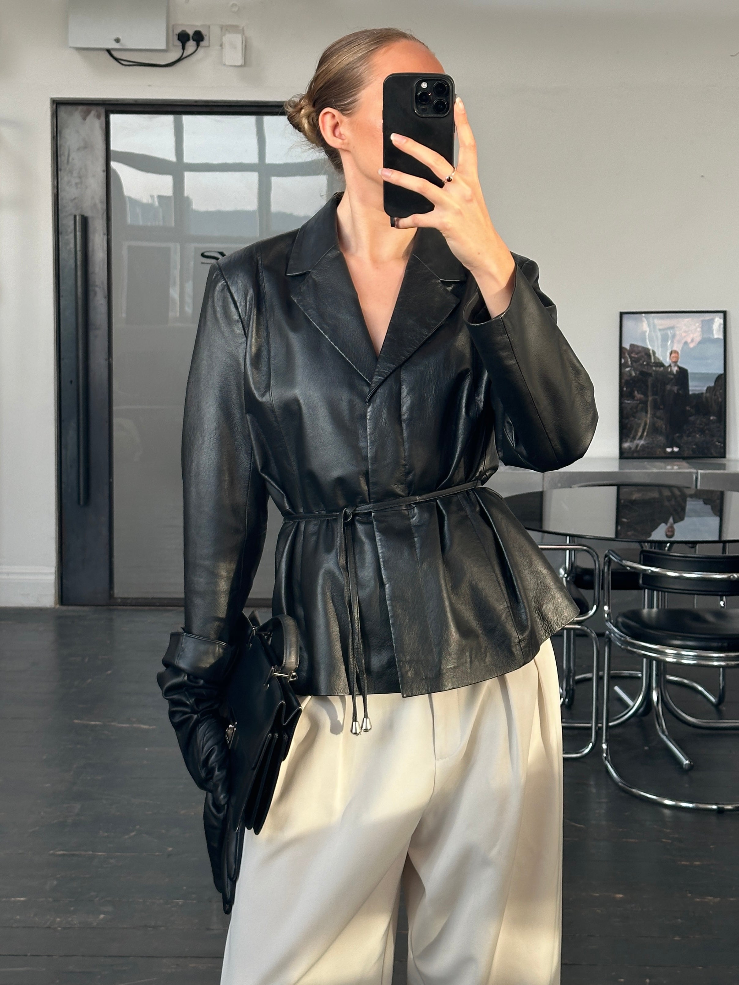 Vintage 2000s leather jacket with rope tie belt, stylish design, in size M, featuring classic vintage fashion details.