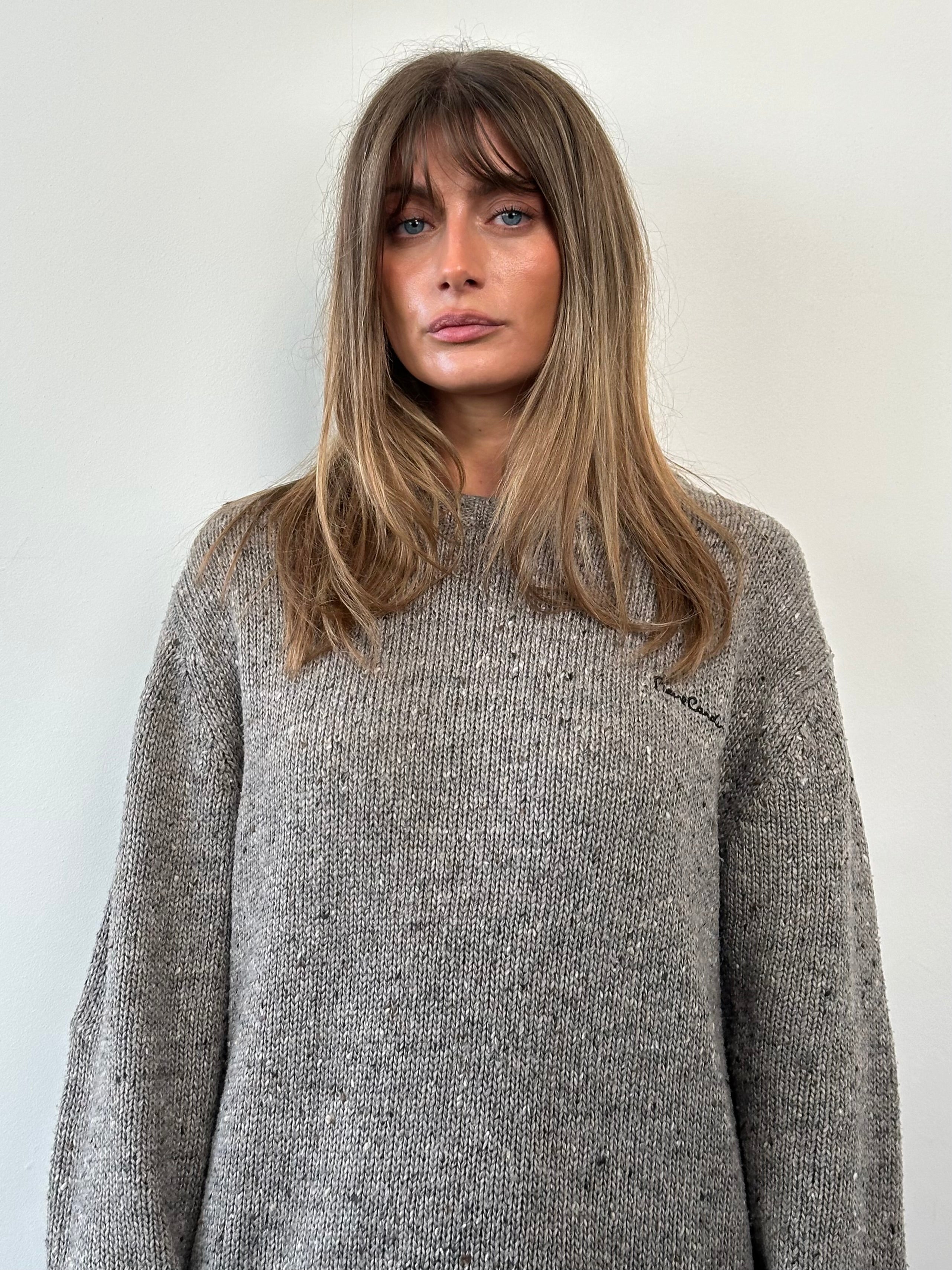 Pierre Cardin speckle knitted jumper in size L/XL, featuring a logo design and cozy, textured knit fabric.