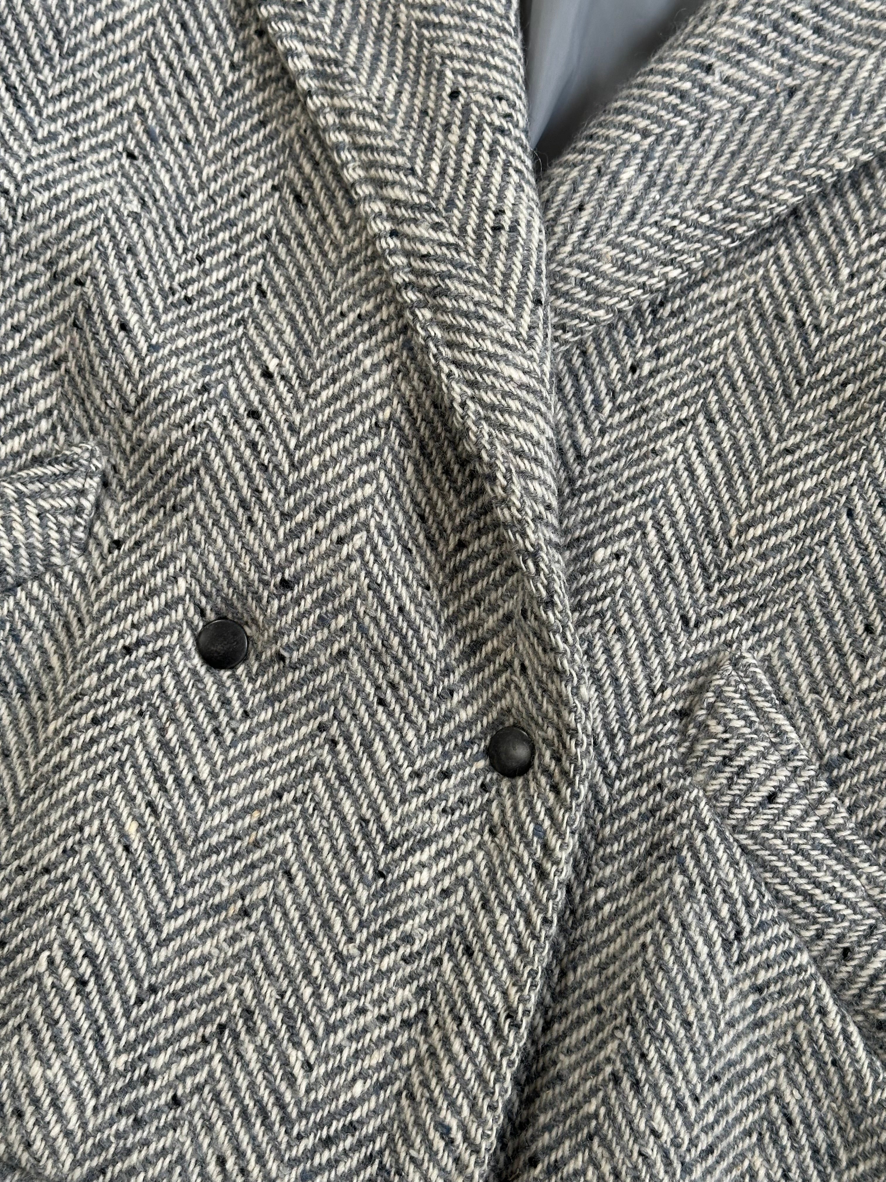 Vintage British 1980s pure wool herringbone bomber jacket in size M/L, classic style with a retro-inspired design.