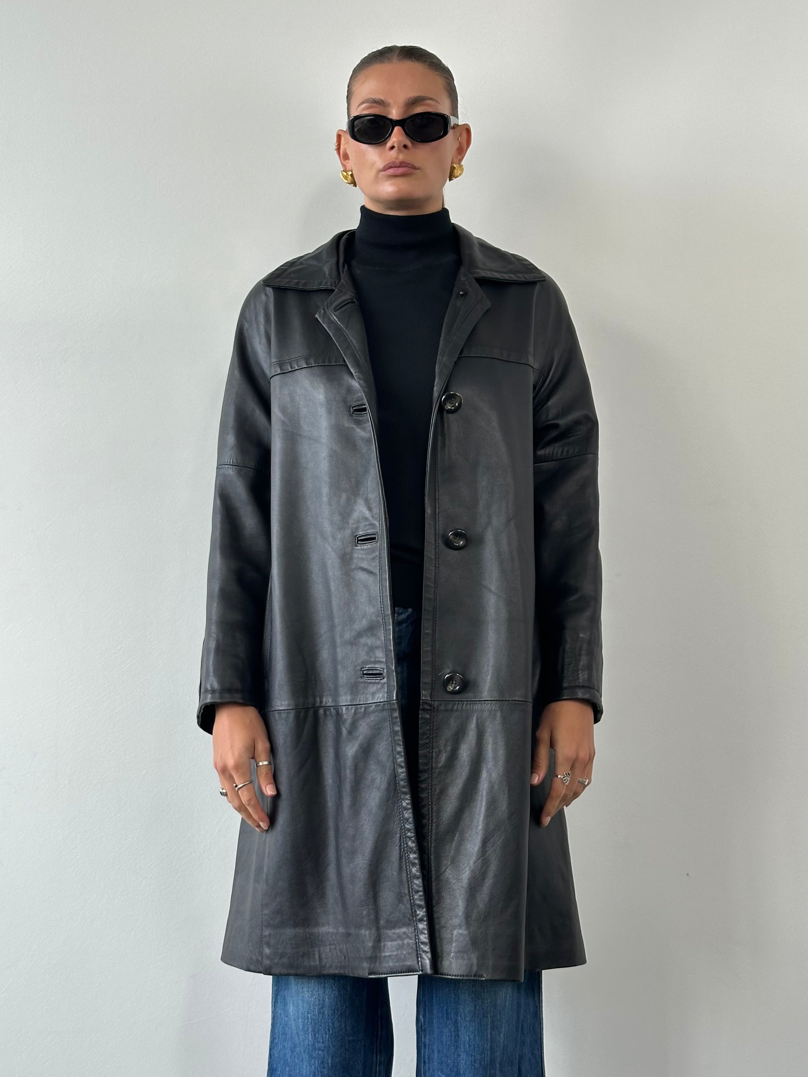 Italian vintage leather trench coat jacket in size L, featuring classic design and rich leather texture.