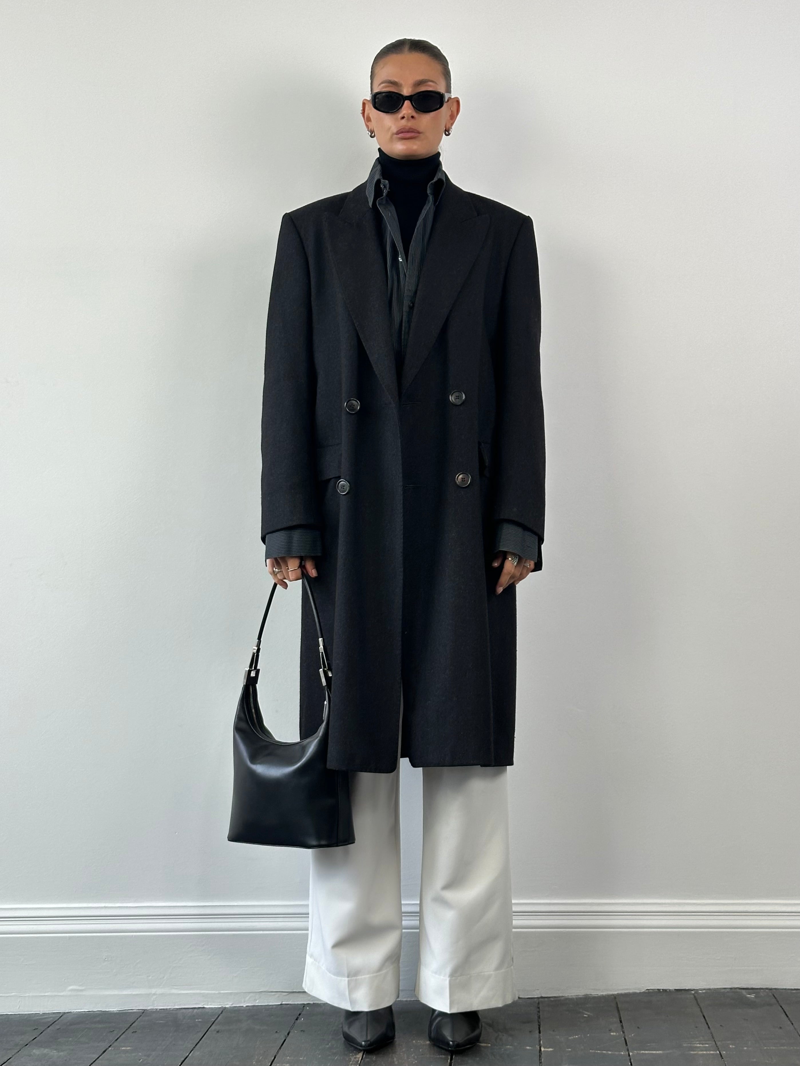 Christian Dior pure wool double-breasted coat in size L/XL, stylish and elegant women’s outerwear with classic design.