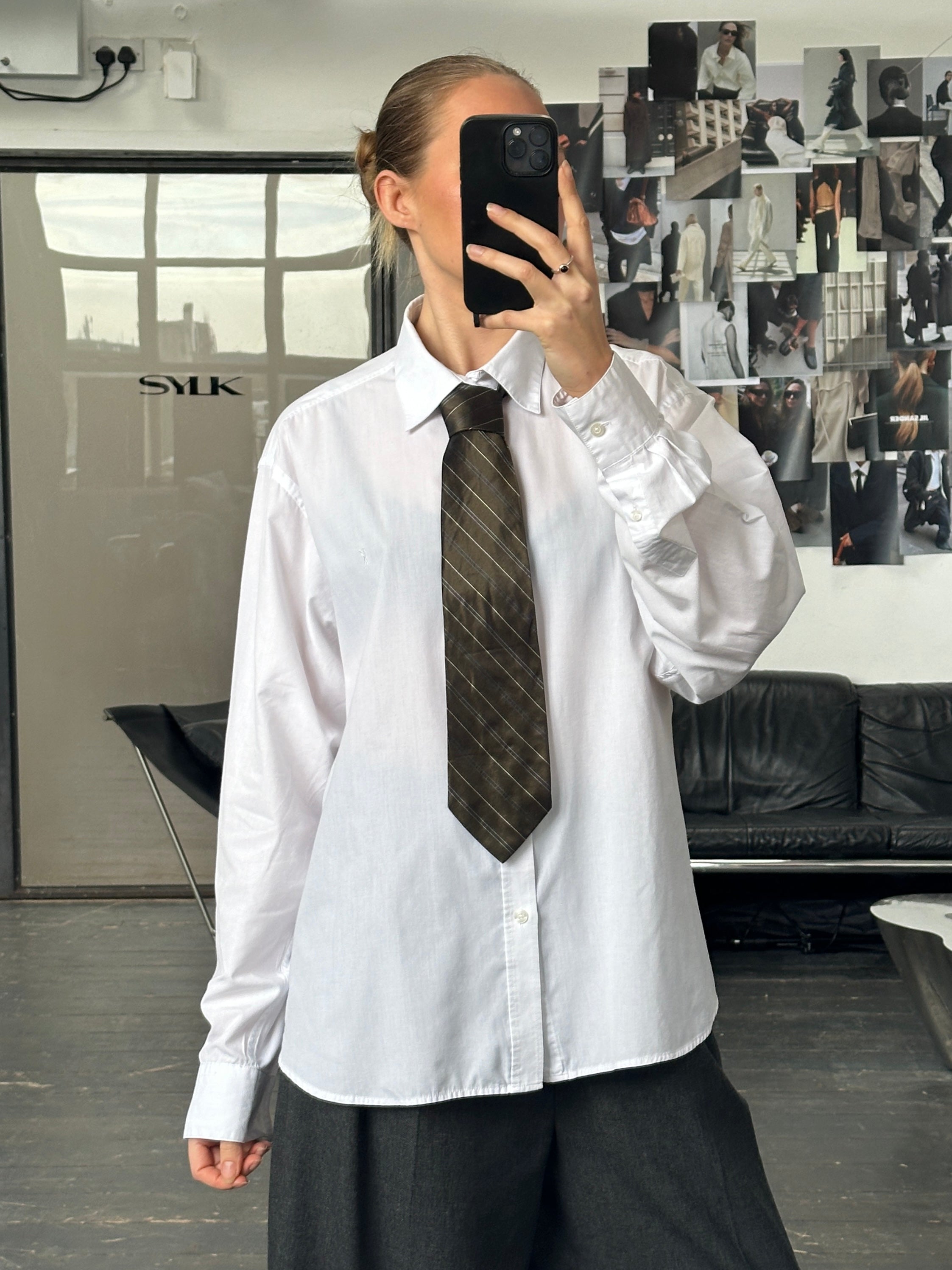 Trussardi 1990s pure silk diagonal stripe tie, showcasing a classic pattern with rich silk fabric and refined craftsmanship.