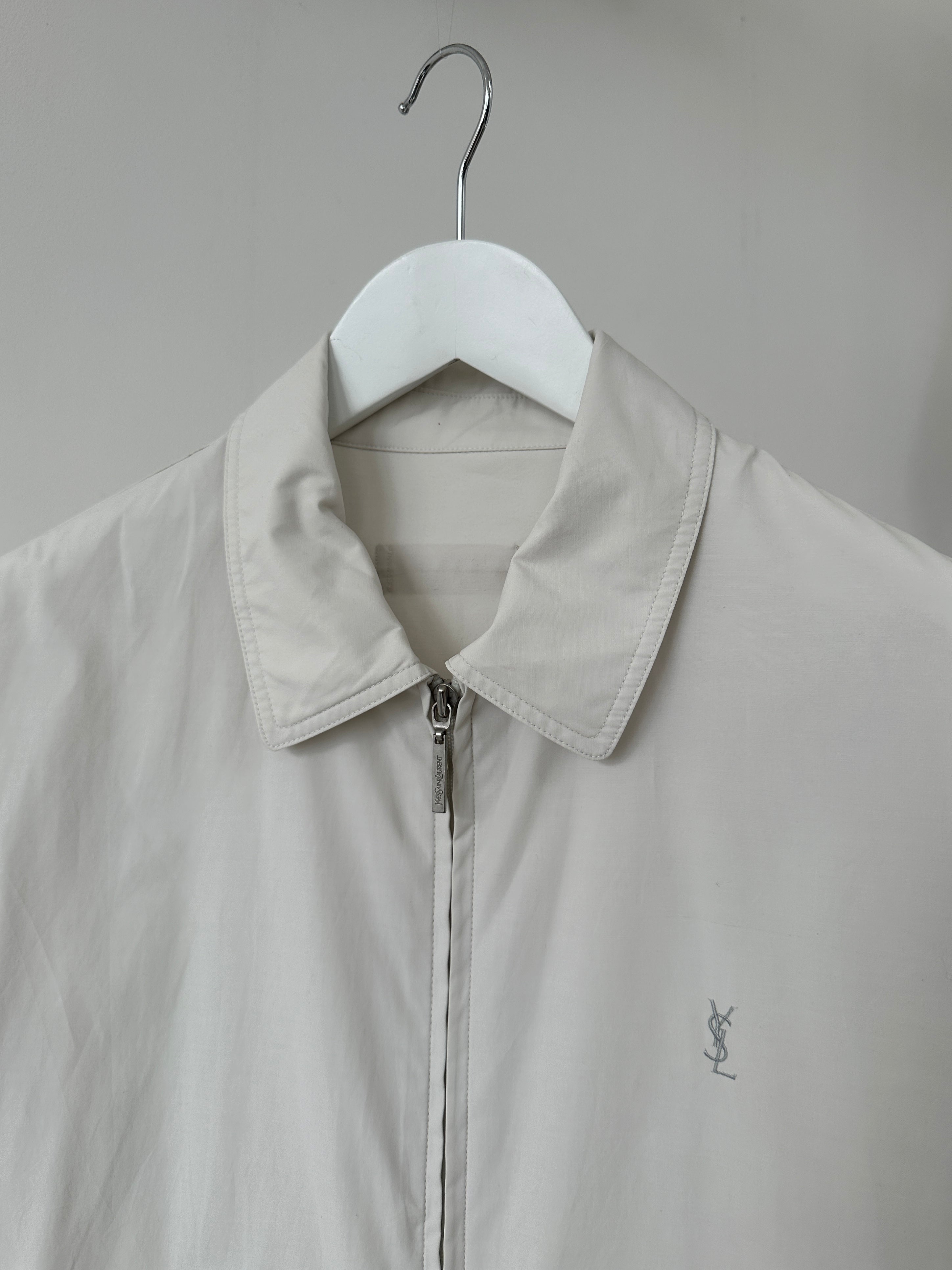Yves Saint Laurent logo bomber jacket in black with front zip and ribbed cuffs, size M/L, stylish and high-quality fashion jacket.
