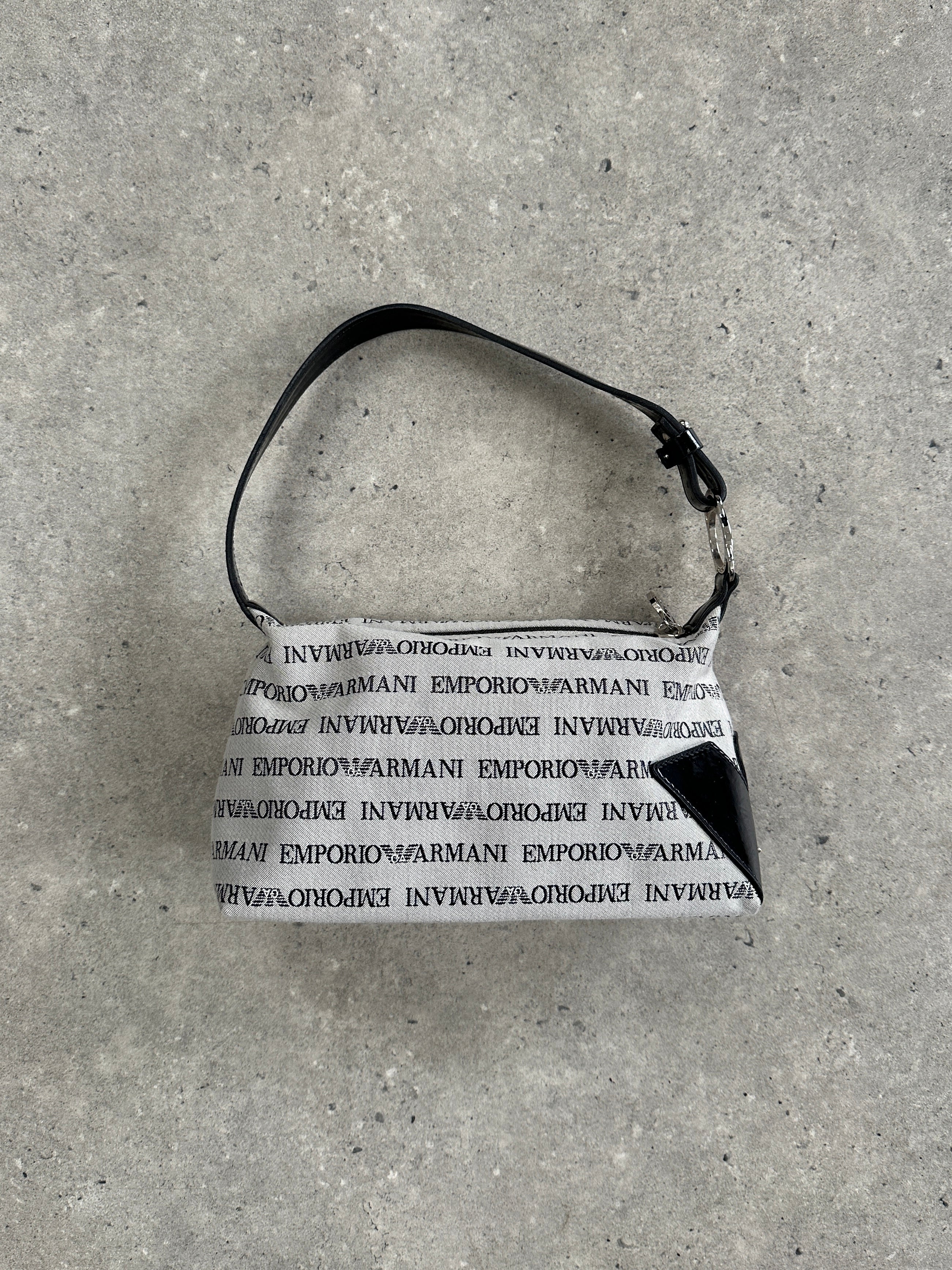 Emporio Armani Monogram Shoulder Bag featuring a structured design with the iconic Armani logo and adjustable shoulder strap.