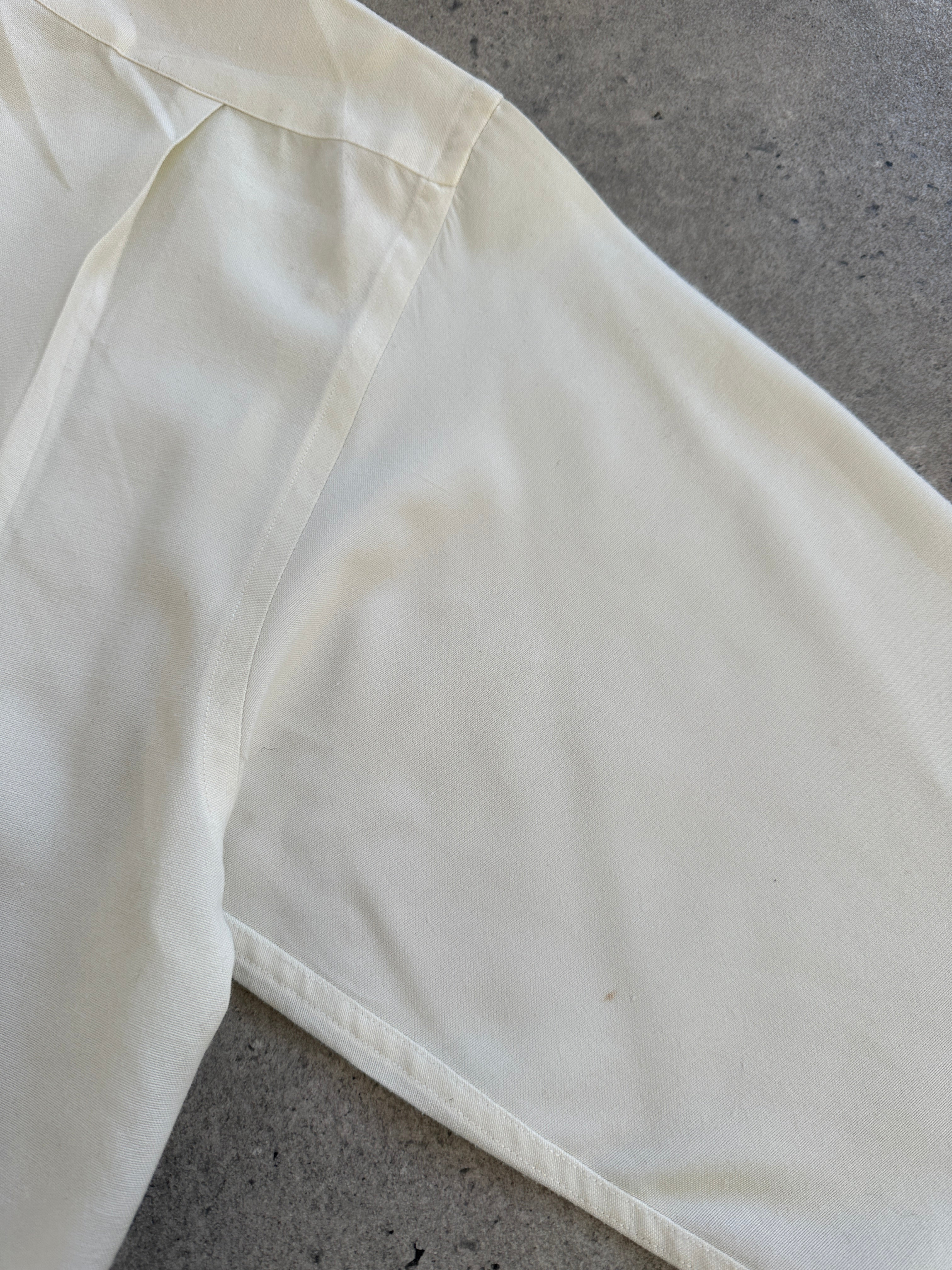 Burberry London 1990s cotton logo shirt in size M, featuring classic Burberry branding and a casual button-up design.