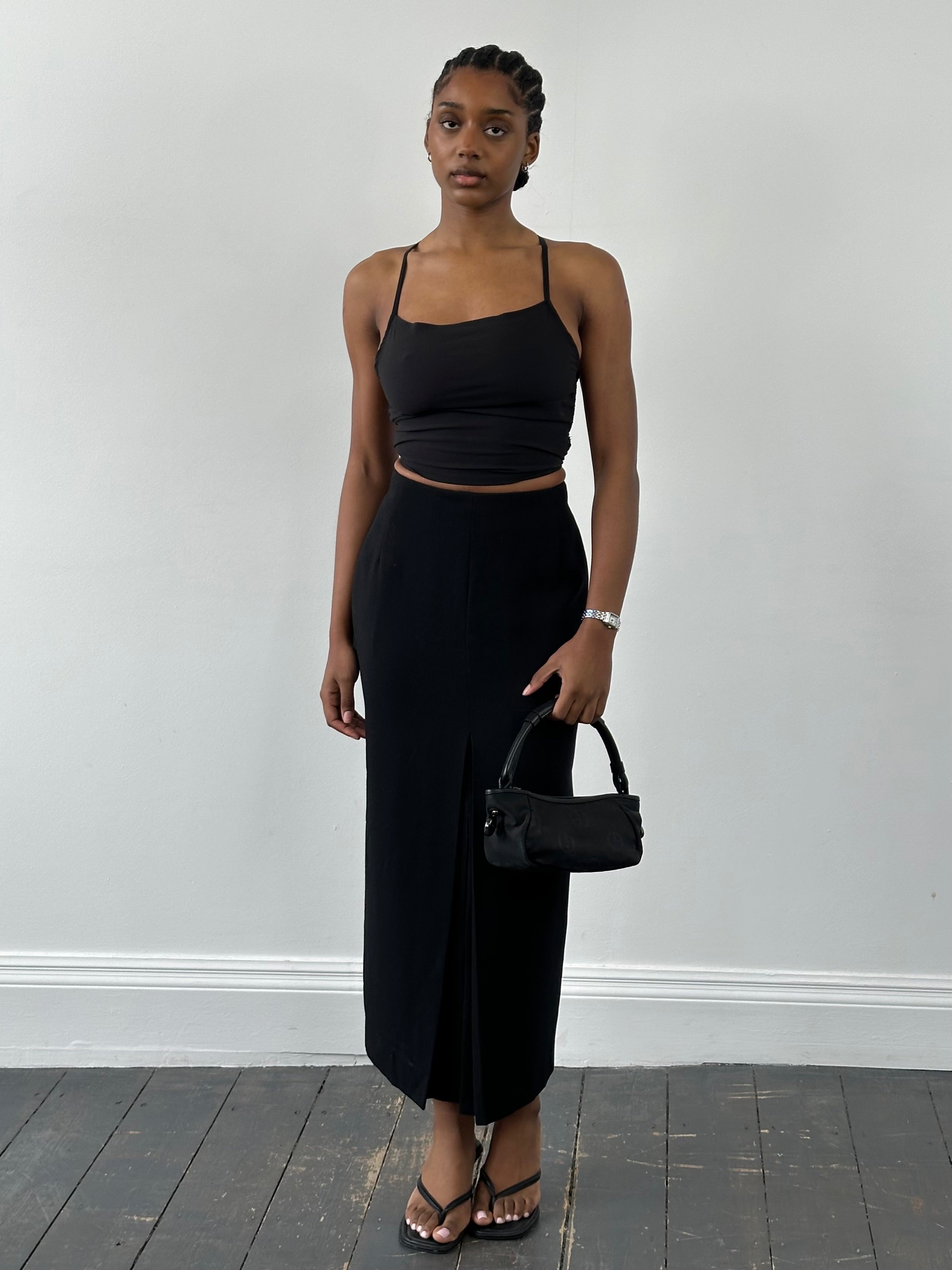Jaeger 1990s pure wool side-split maxi skirt in deep color, featuring a flowing design and side slit, W24 size.