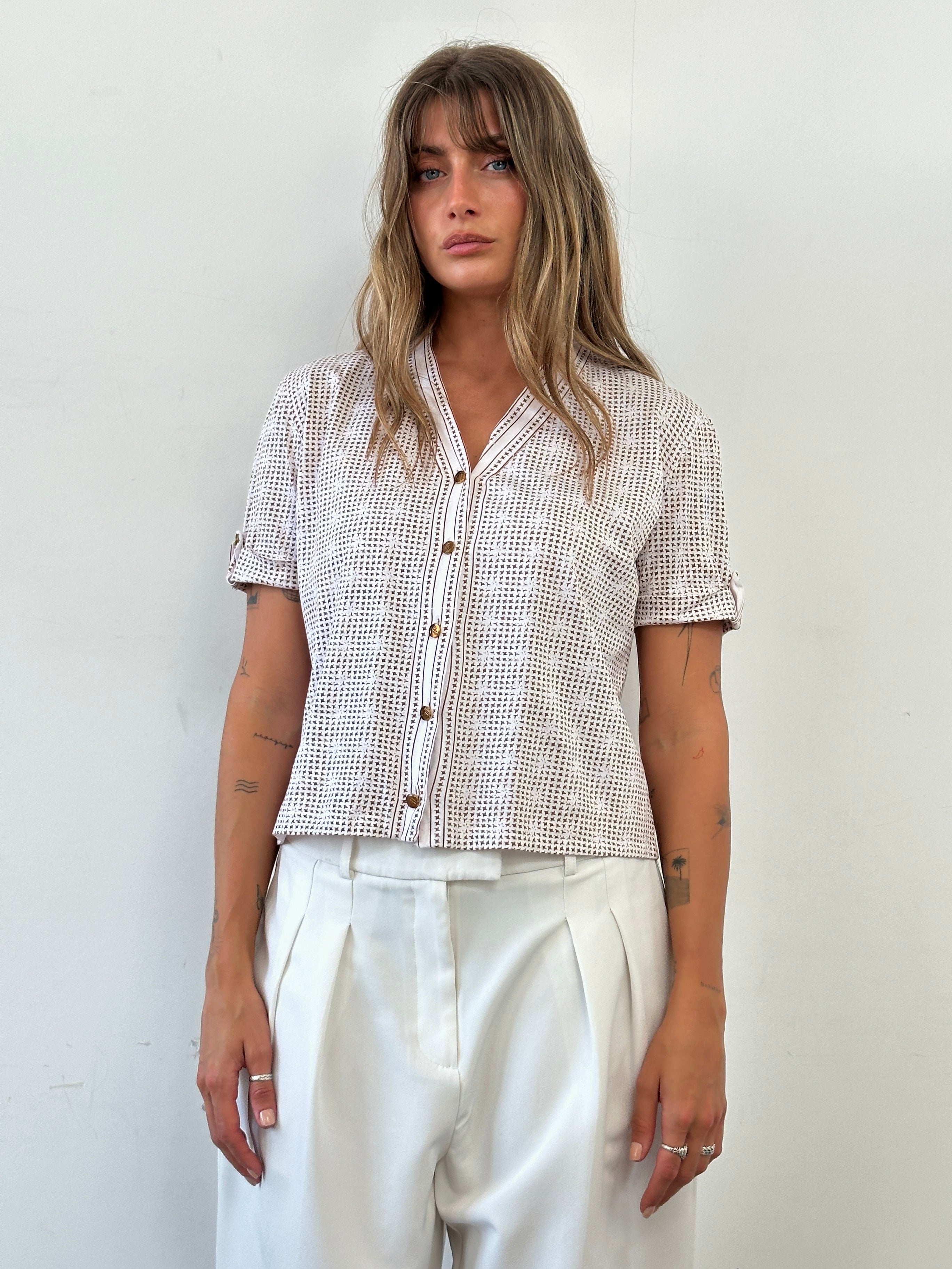 Louis Feraud pure cotton cropped monogram short sleeve shirt in white with branded logo details, size M, laid flat.