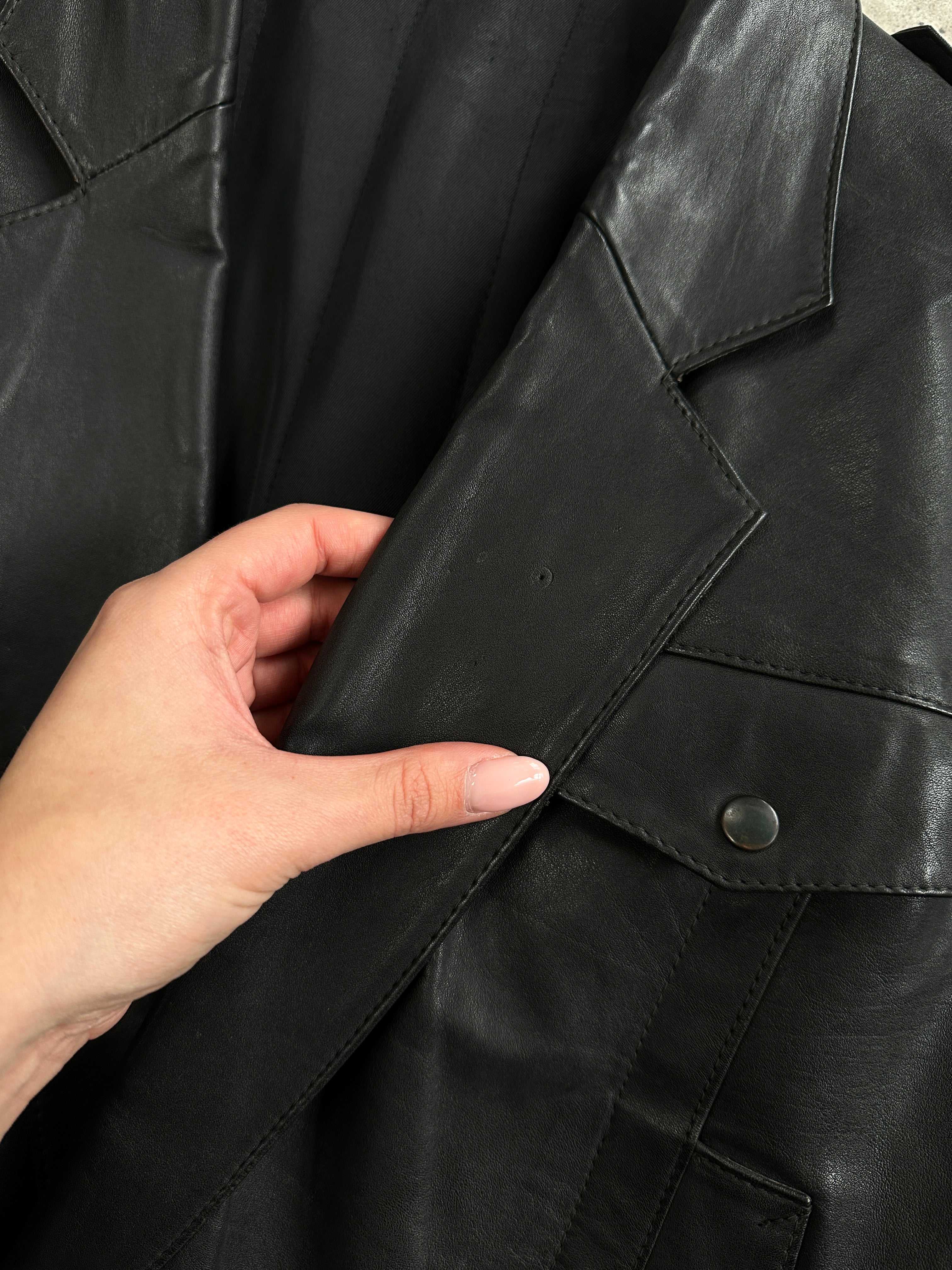 Vintage leather bomber jacket for men, size small, featuring classic collar, zip closure, and rugged style.