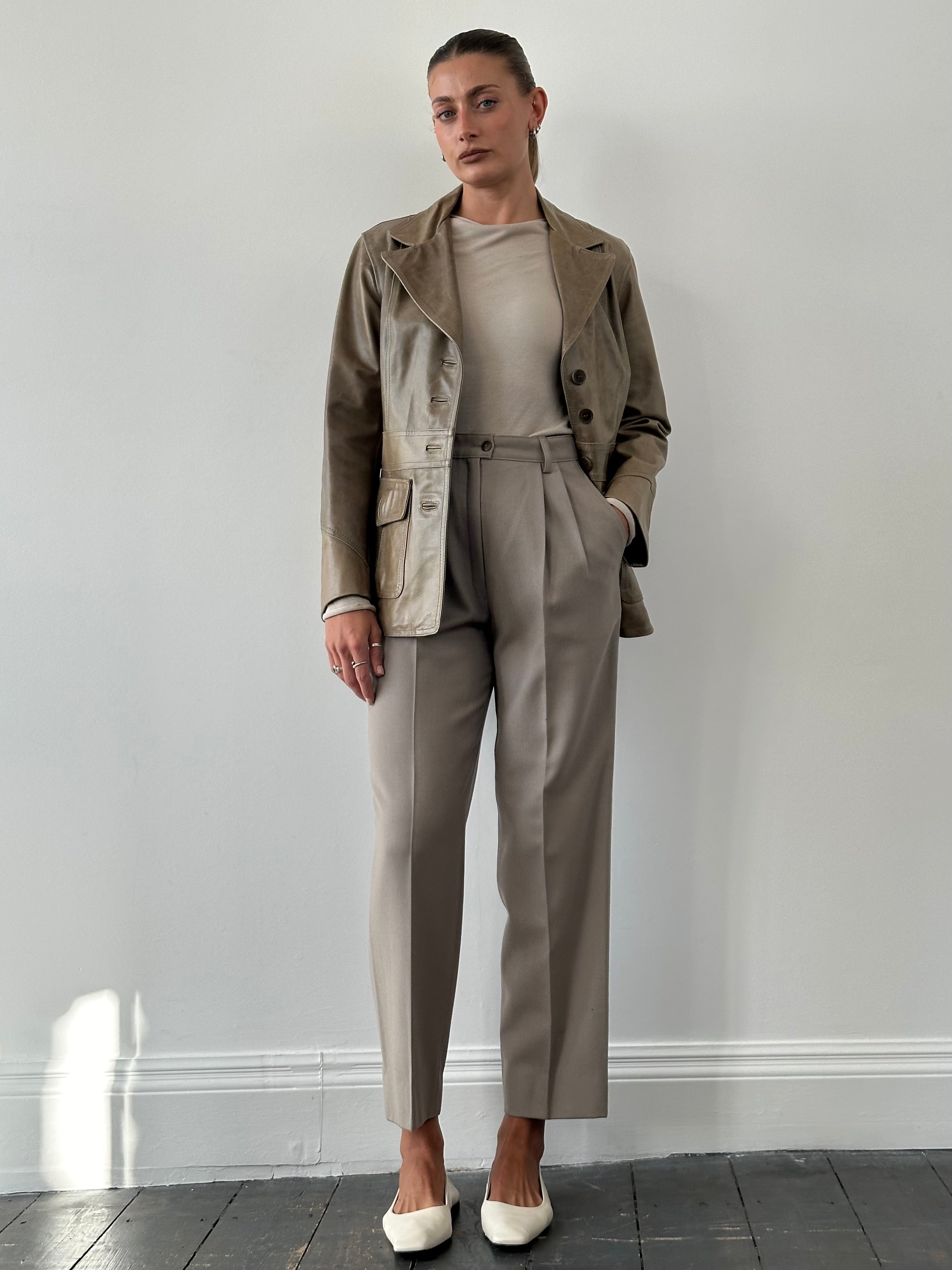 Italian Vintage high-waisted wool trousers in size W26, showcasing classic vintage style and tailored fit.