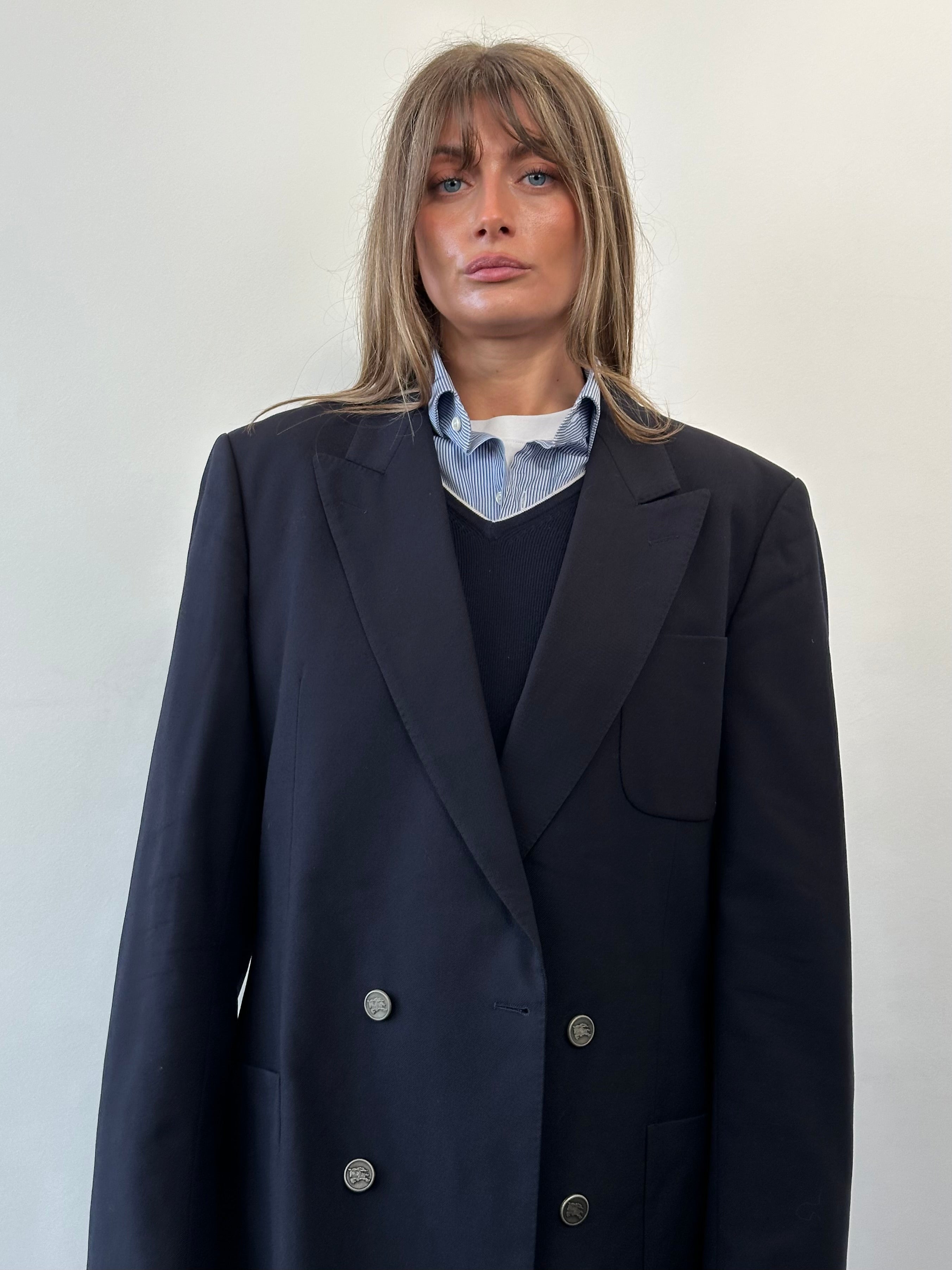 Burberry wool bespoke double-breasted blazer in size 44R/XL, featuring classic tailored design with buttons and structured fit.