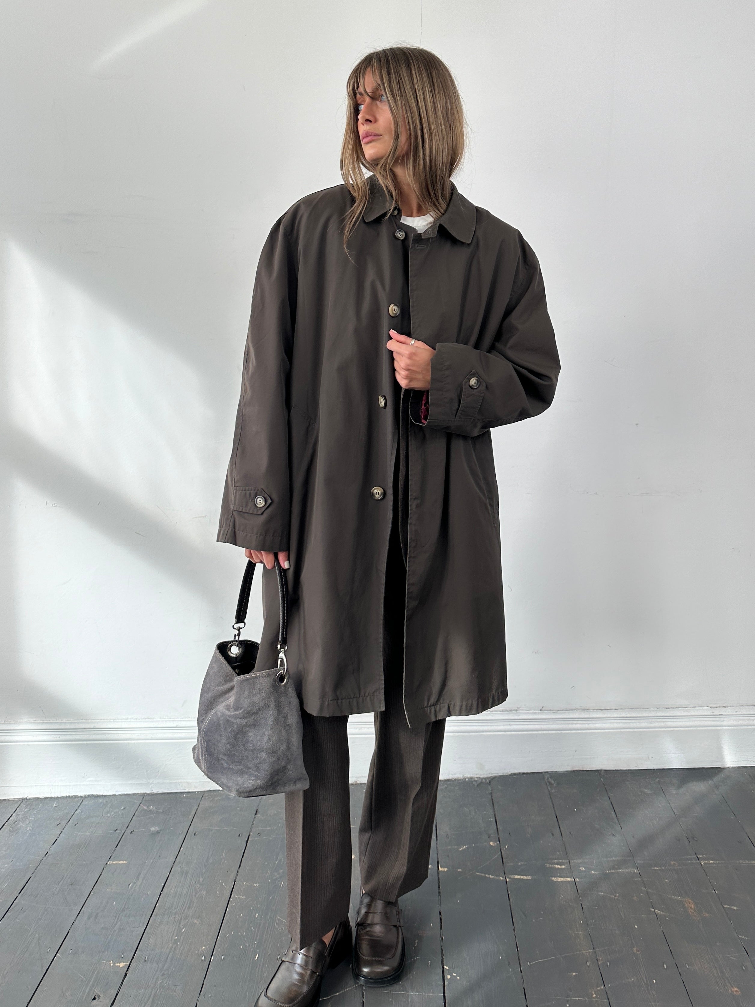 Vintage concealed placket trench coat in XXL, showcasing classic design, belted waist, and double-breasted style on a neutral background.