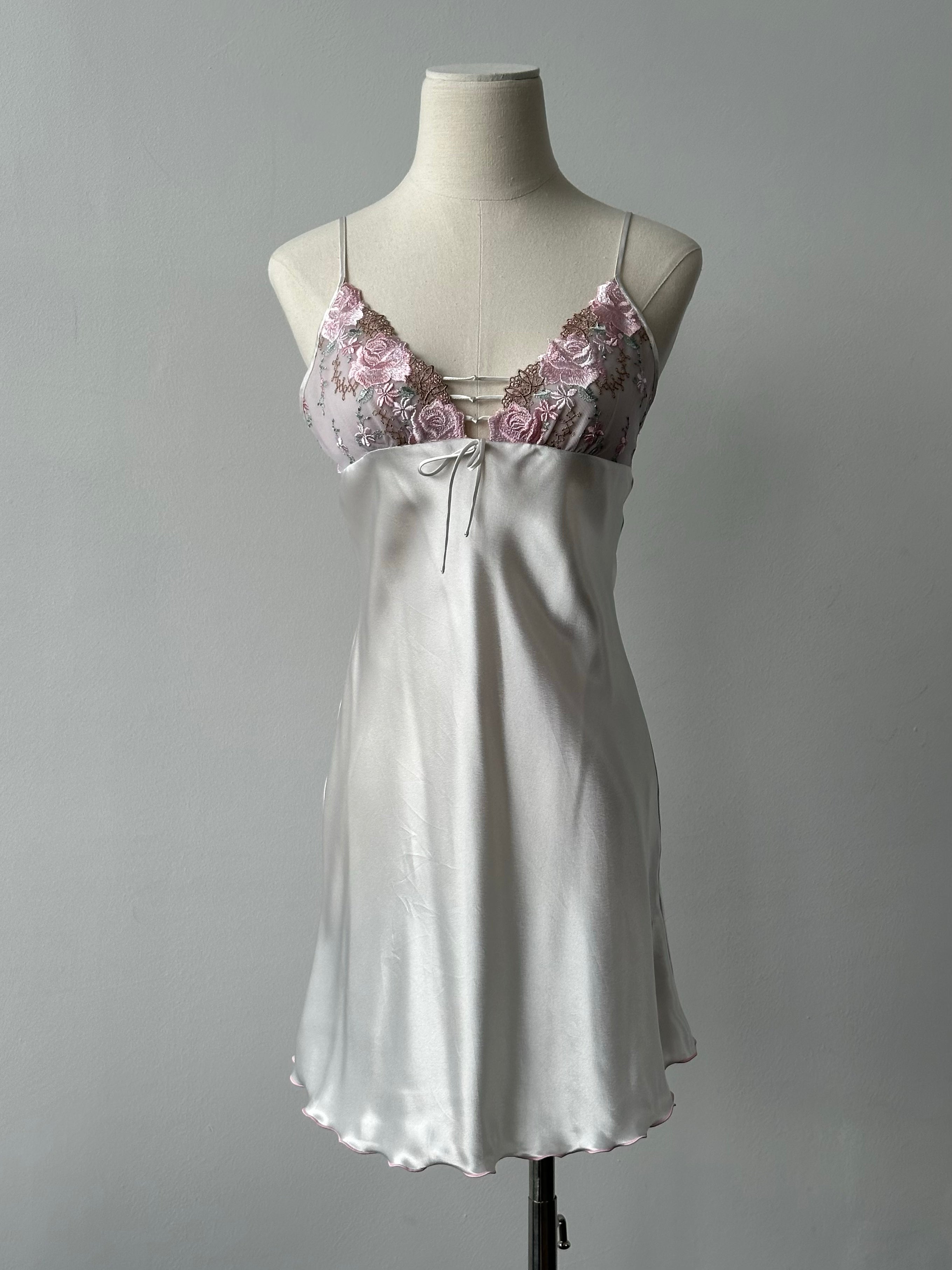 Vintage 2000s satin floral lace mini slip dress in XS, featuring delicate lace trim and a vintage-inspired floral pattern.