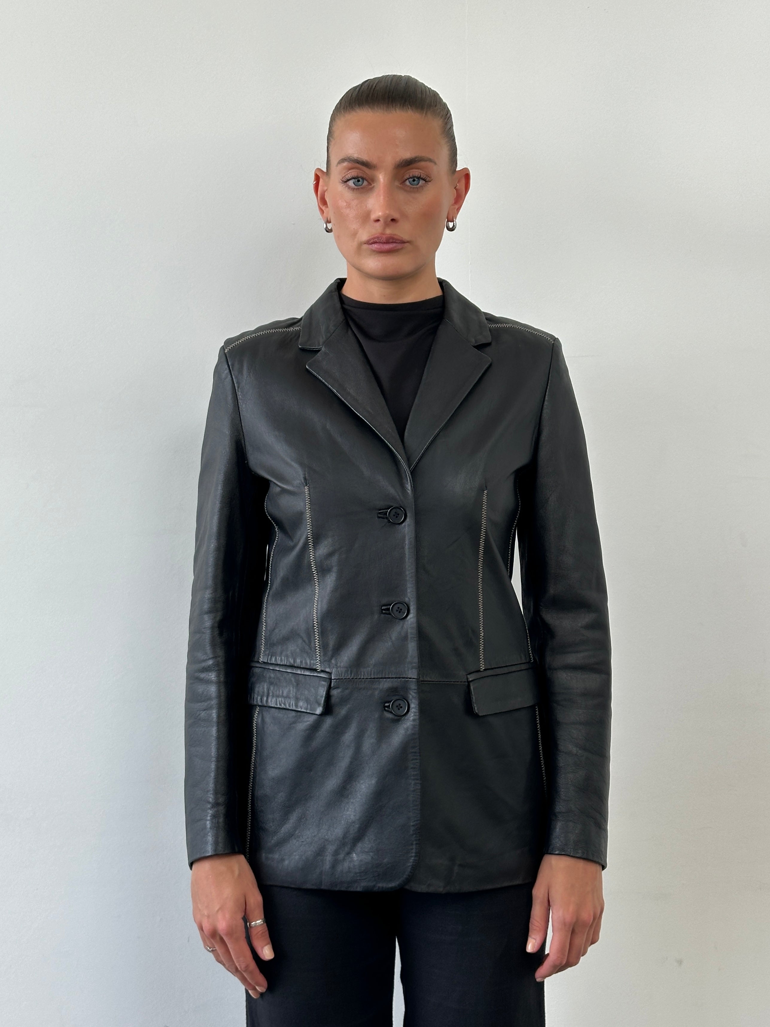 Conbipel single-breasted leather blazer jacket in black, tailored fit with notch lapels and sleek design for men.