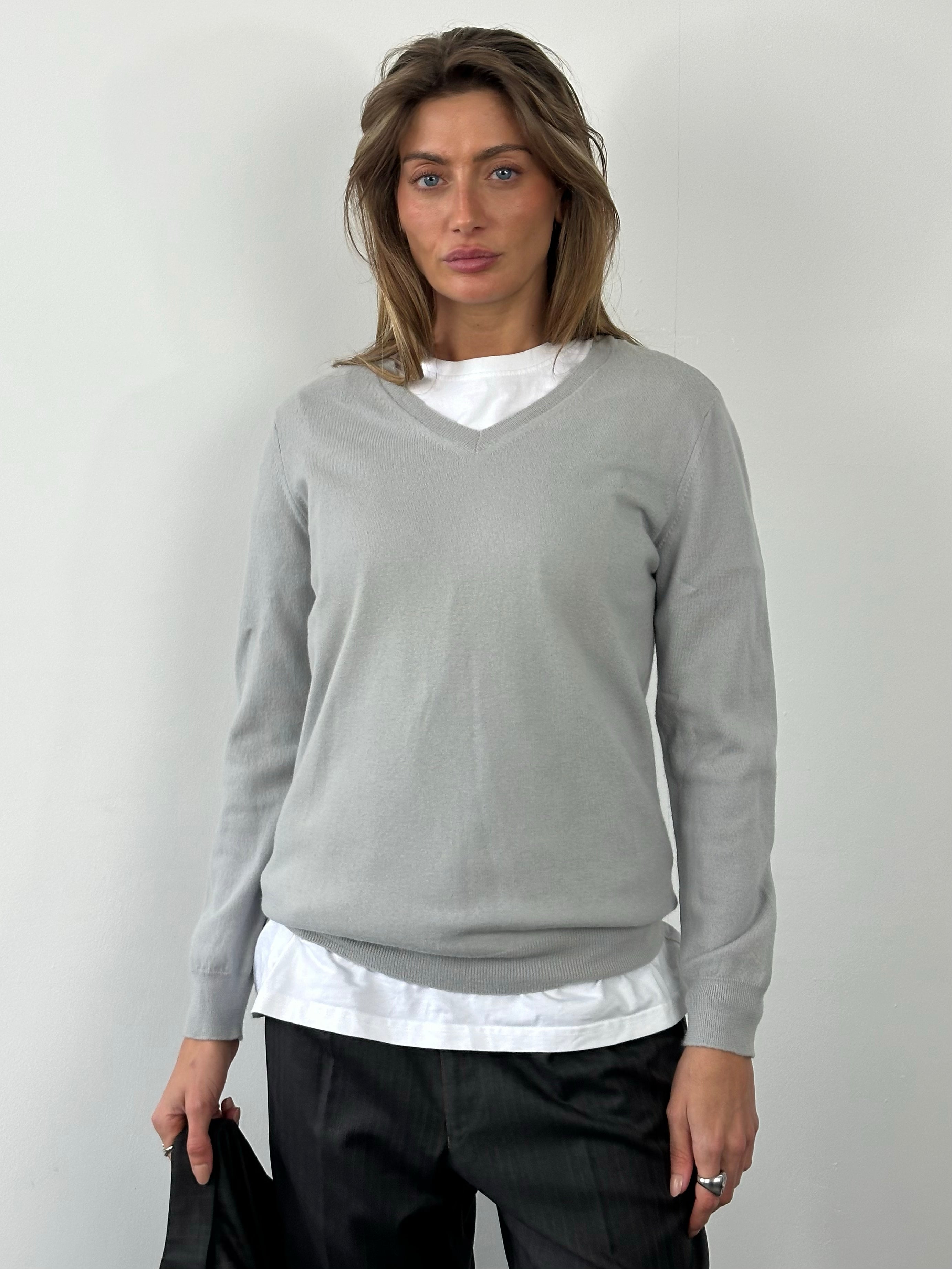 Burberry Brit 2000s merino wool V-neck jumper in size M, featuring classic design and soft knit fabric.