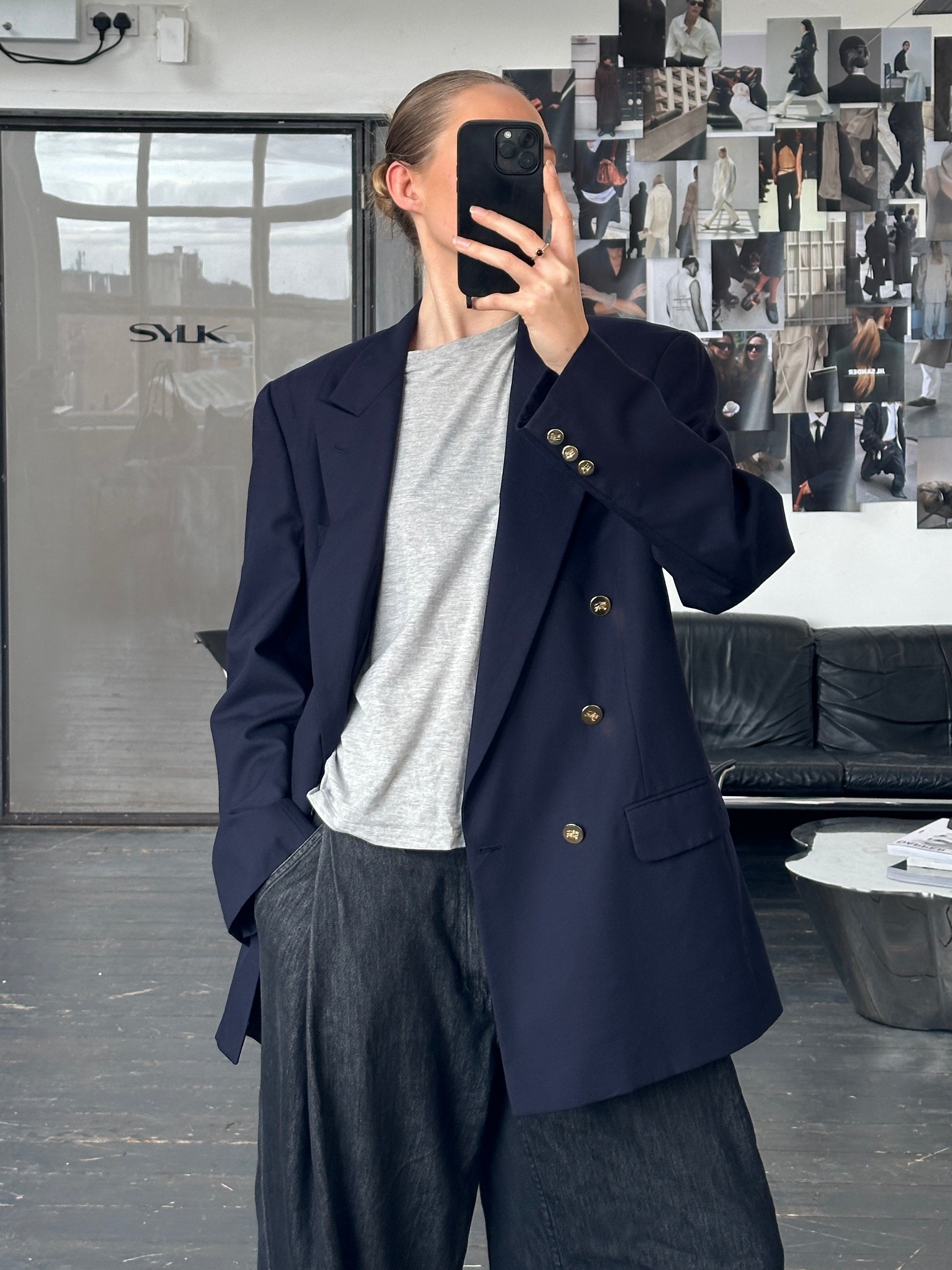 Burberry 1990s double-breasted pure wool blazer in size 42R/XL, featuring classic tailoring and signature Burberry pattern details.