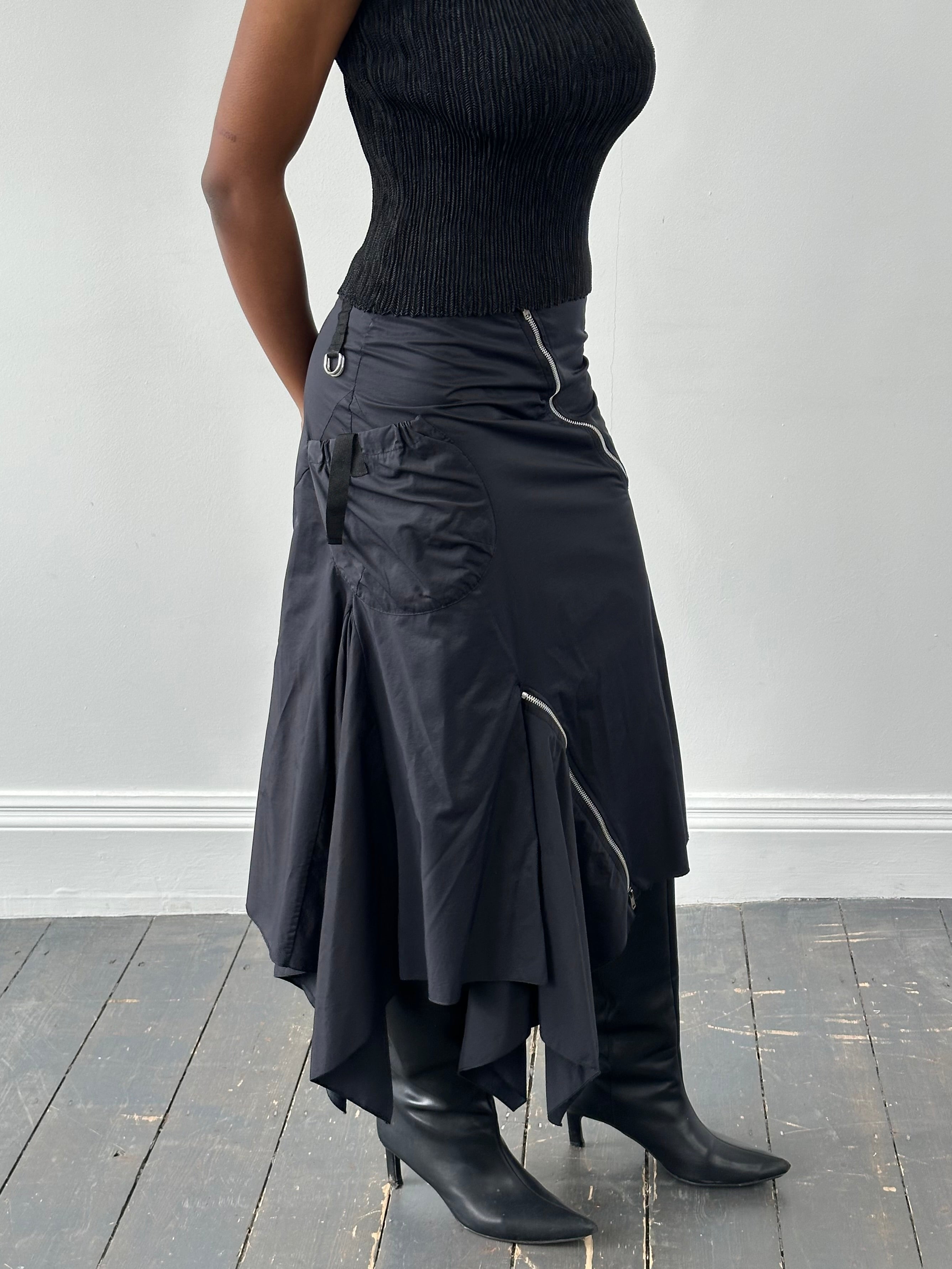 Vintage 1990s cotton multi-zip ruffle skirt in size W28, showcasing retro style and colorful layered ruffles.