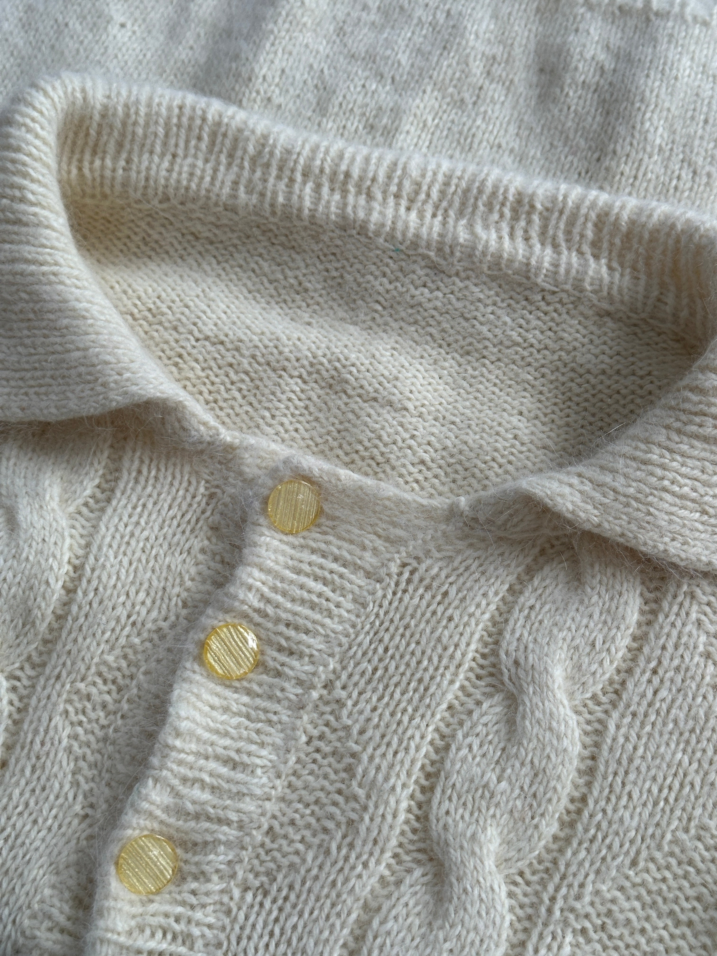 Vintage 1980s mohair knitted polo jumper, medium size, featuring a classic design in soft, textured fabric.