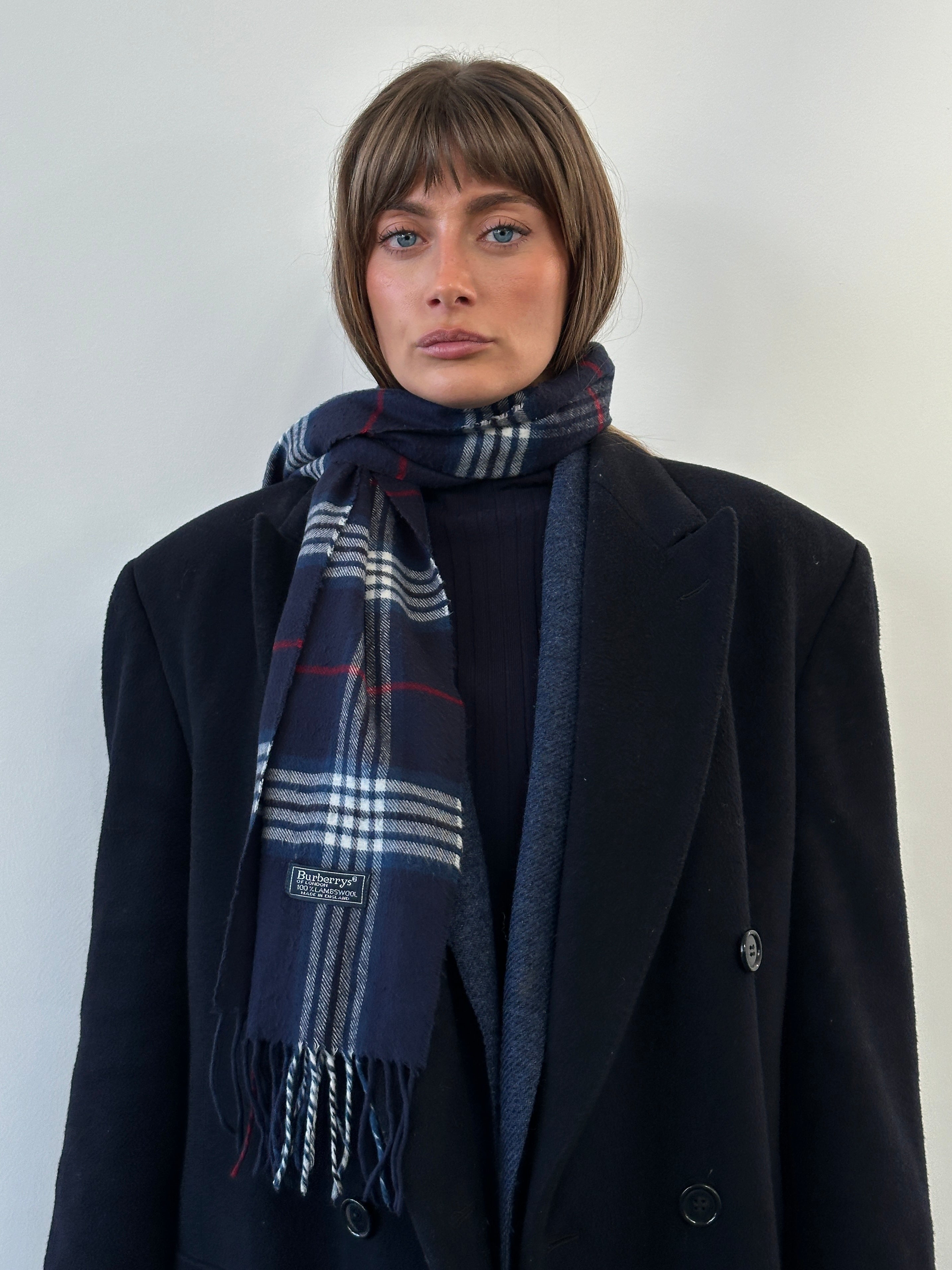 Burberry 1990s pure lambswool check scarf featuring classic Burberry plaid pattern in neutral tones.