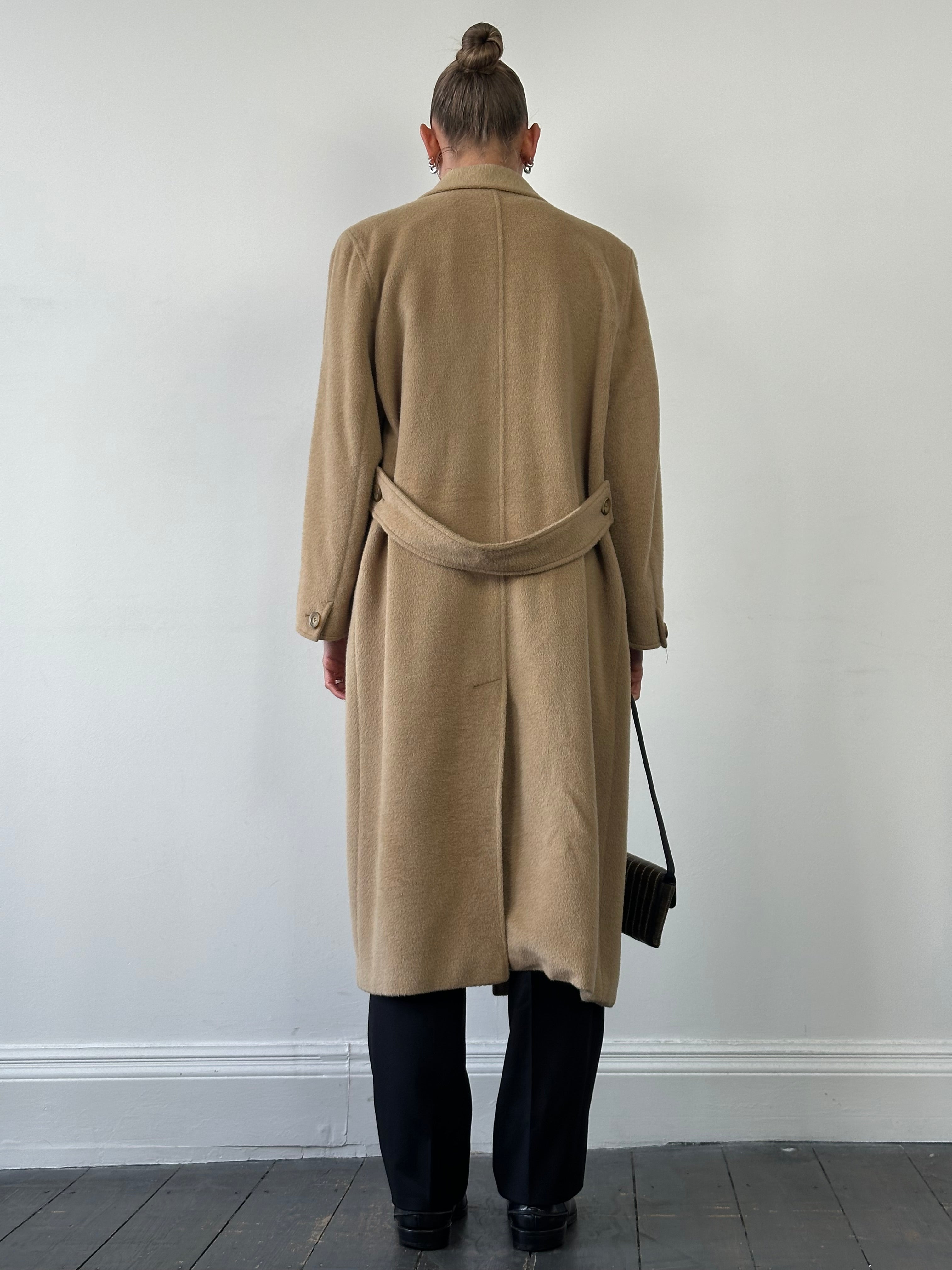 Max Mara wool camel hair double-breasted coat in size M/L displayed on a hanger with a neutral background.