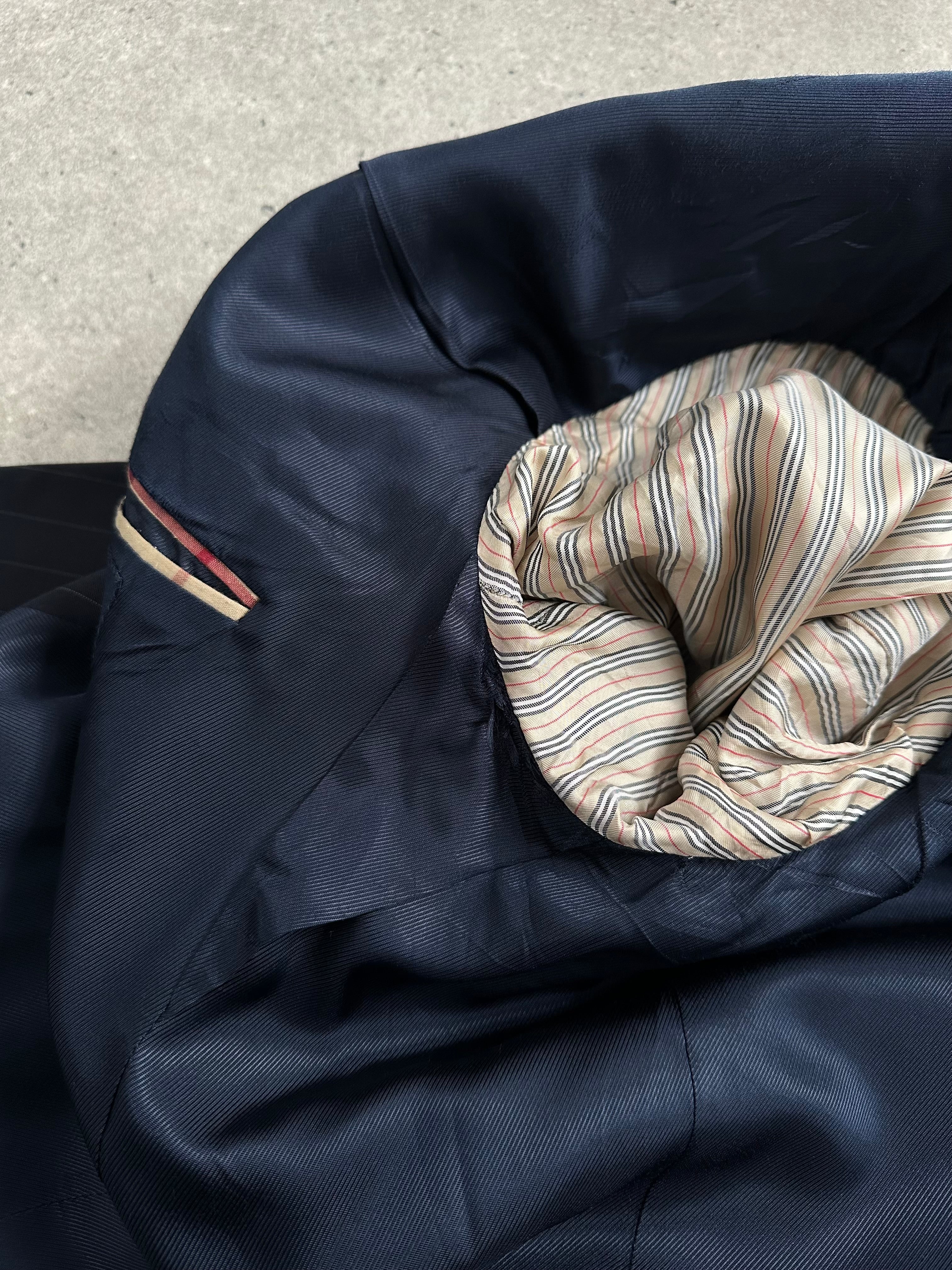 Burberry London 2000s wool stripe single-breasted blazer in size 48R/XXL, featuring classic tailored design and bold striped pattern.