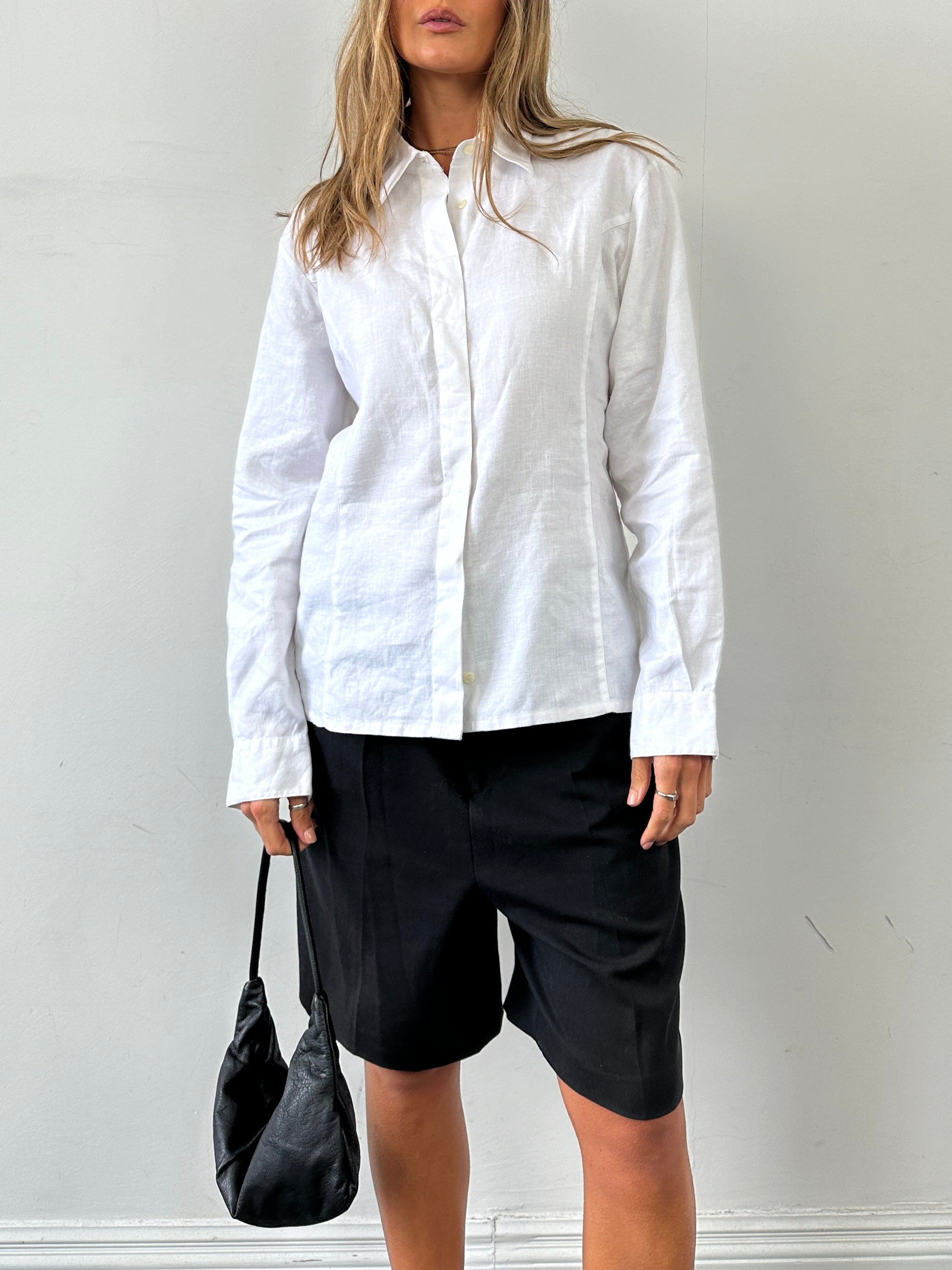 Vintage pure linen shirt with concealed placket, size M, featuring a classic, lightweight design and natural fabric texture.