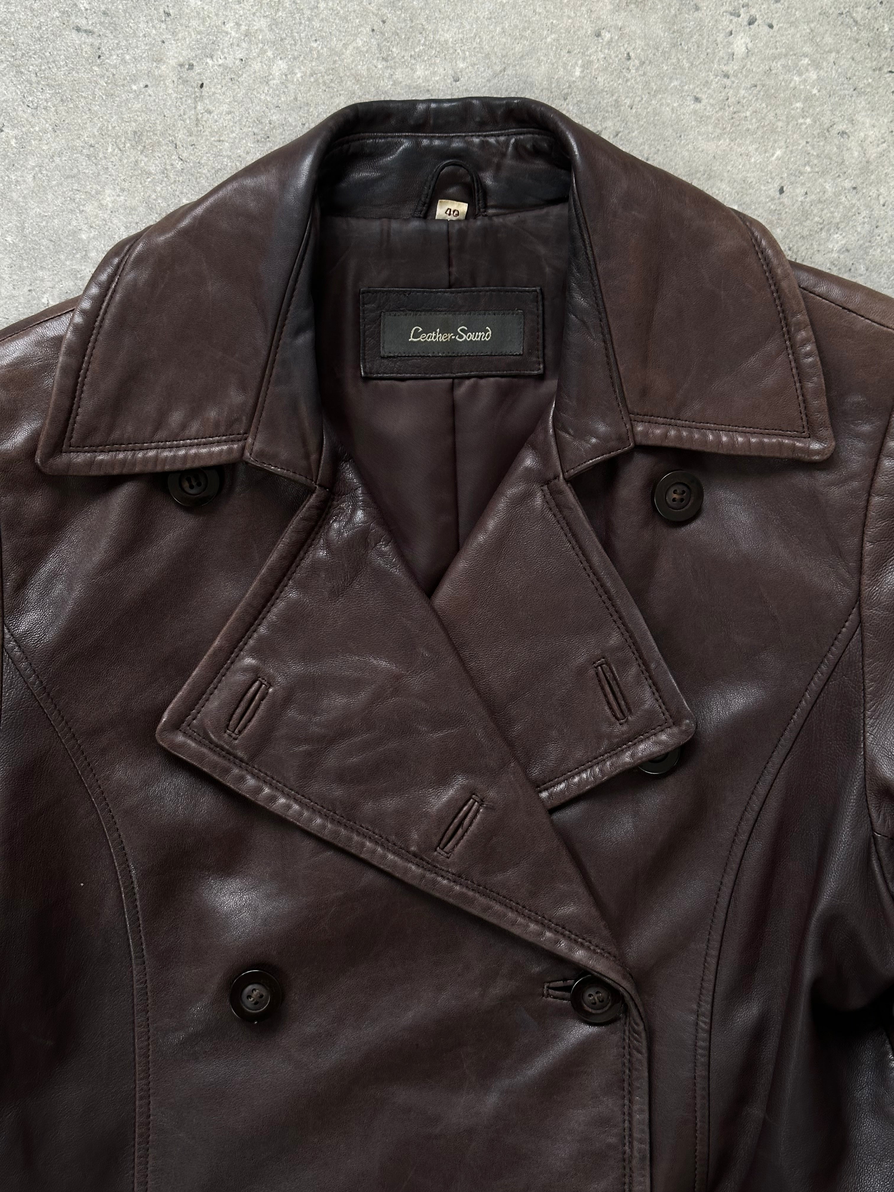 Vintage 1990s double-breasted lamb leather jacket in size M, featuring classic design and soft, high-quality leather.