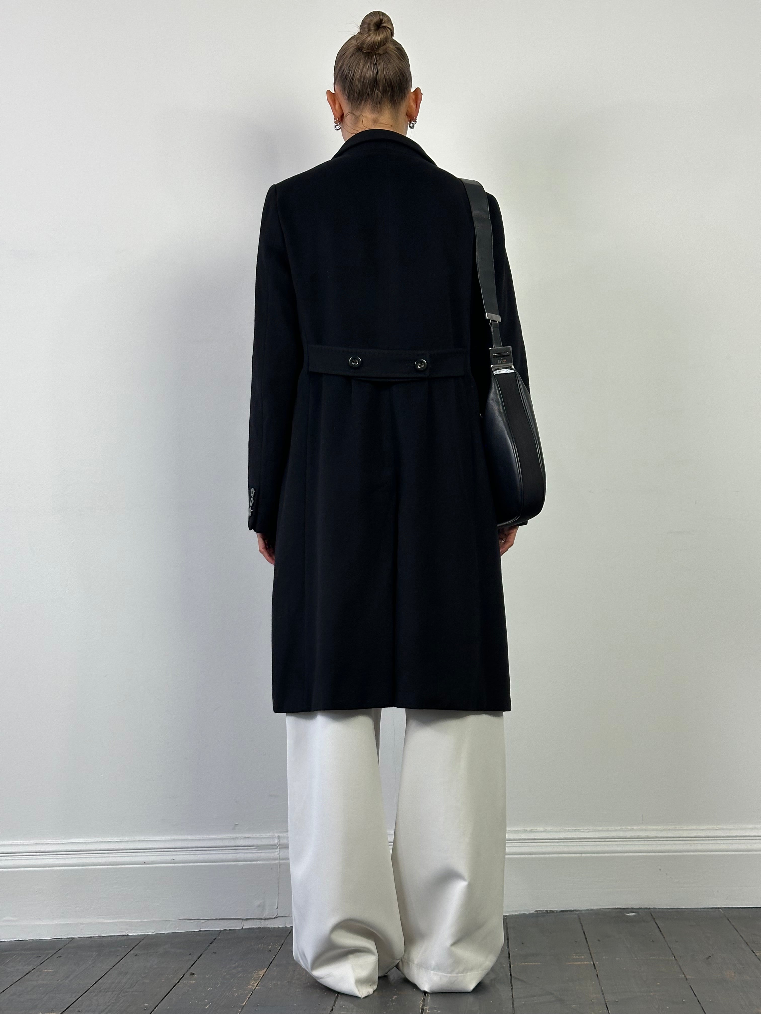 Max Mara Studio pure virgin wool single-breasted coat in black, displayed on a hanger with a tailored fit and classic design.