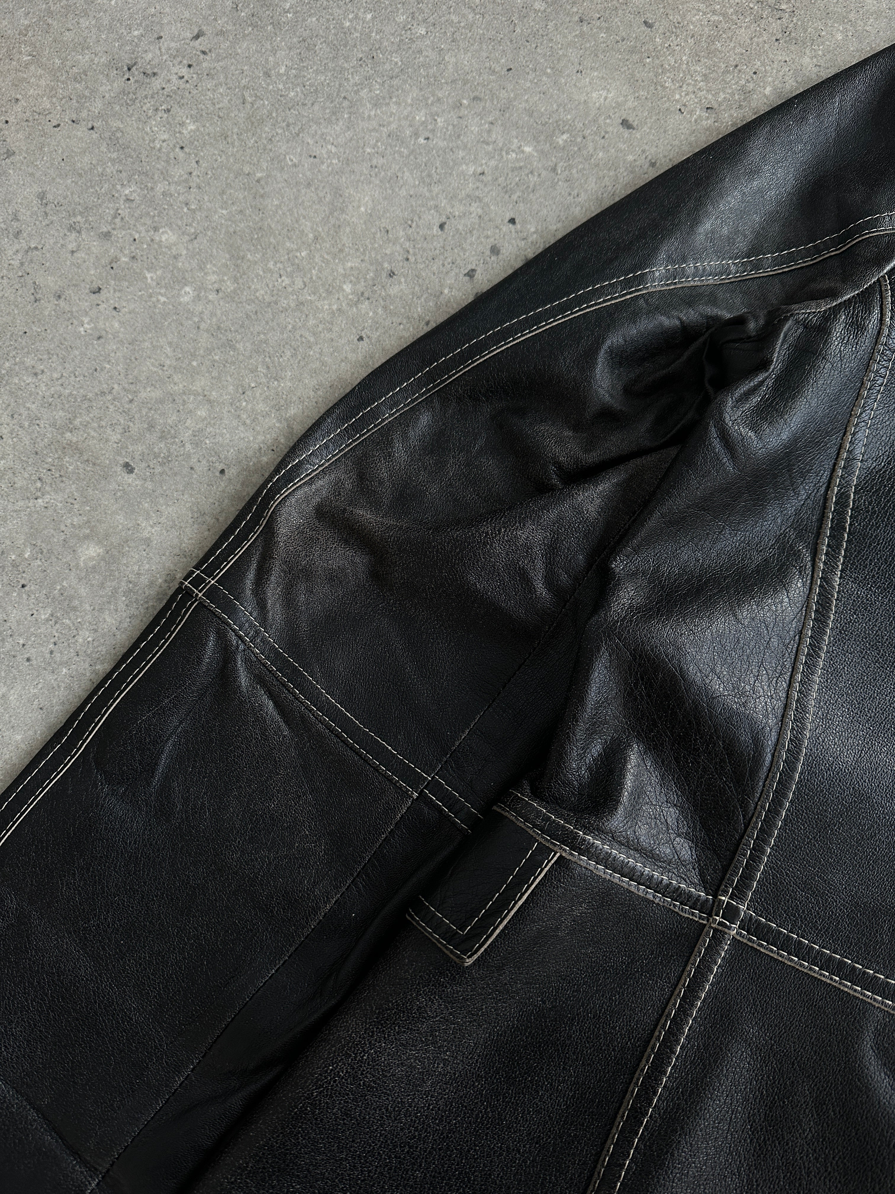 Marella contrast stitch leather jacket in size S, featuring stylish design and detailed stitching, shown on a flat surface.
