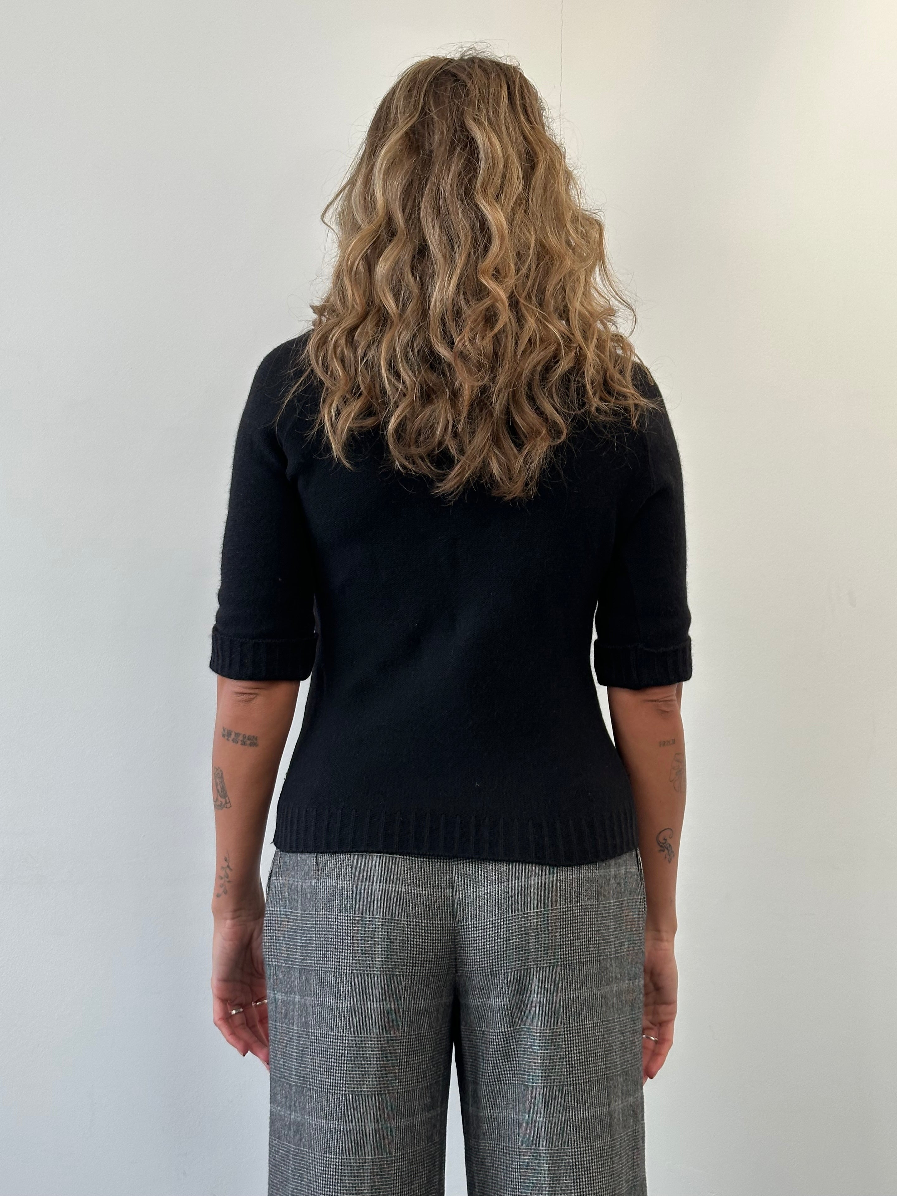 Max Mara Max Max Weekend wool roll neck jumper in size S, cream-colored, soft knit fabric, close-up of the cozy sweater.