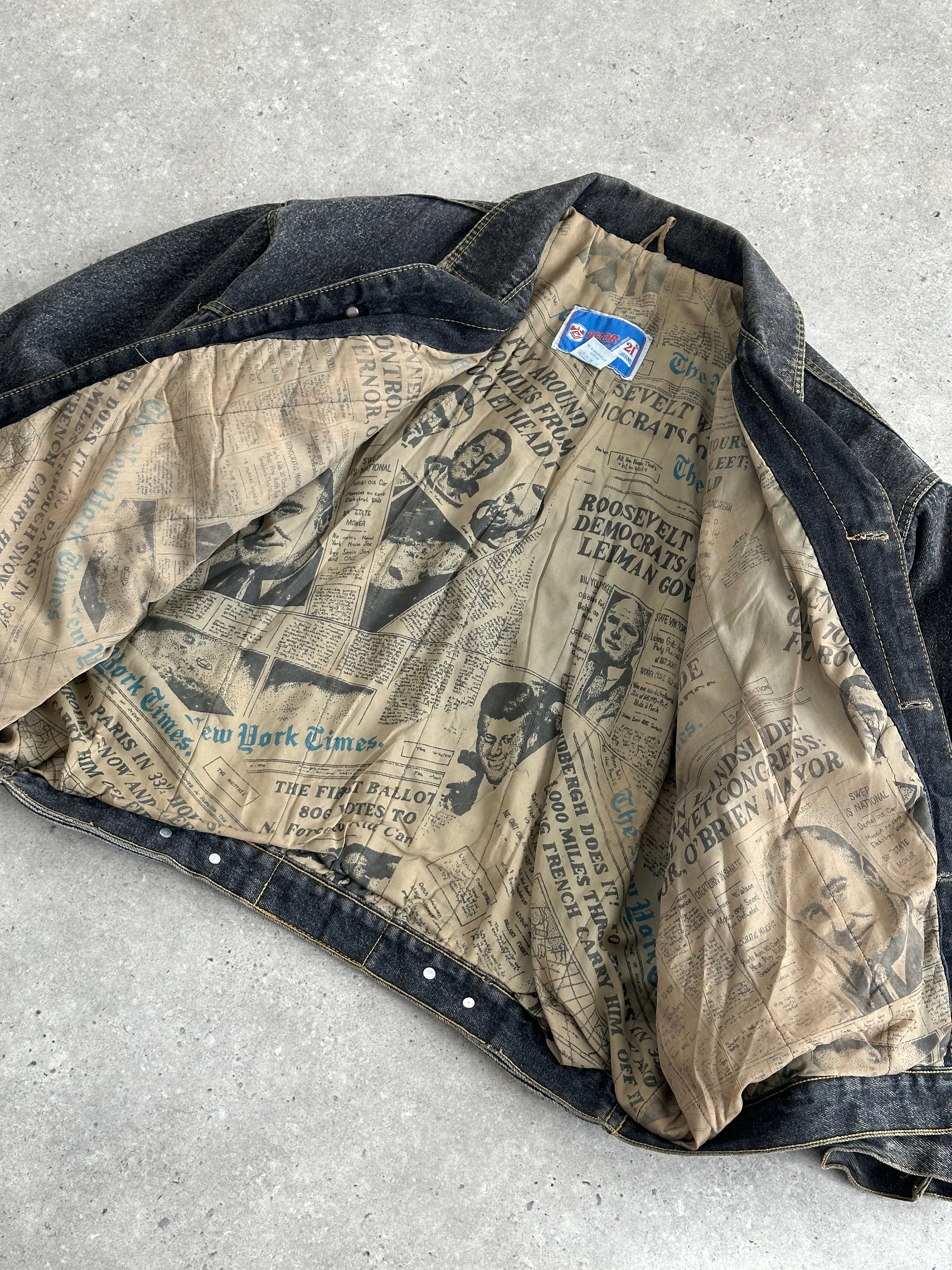 Vintage 1990s boxy denim jacket, medium size, featuring classic design and distressed details, stylish casual outerwear.