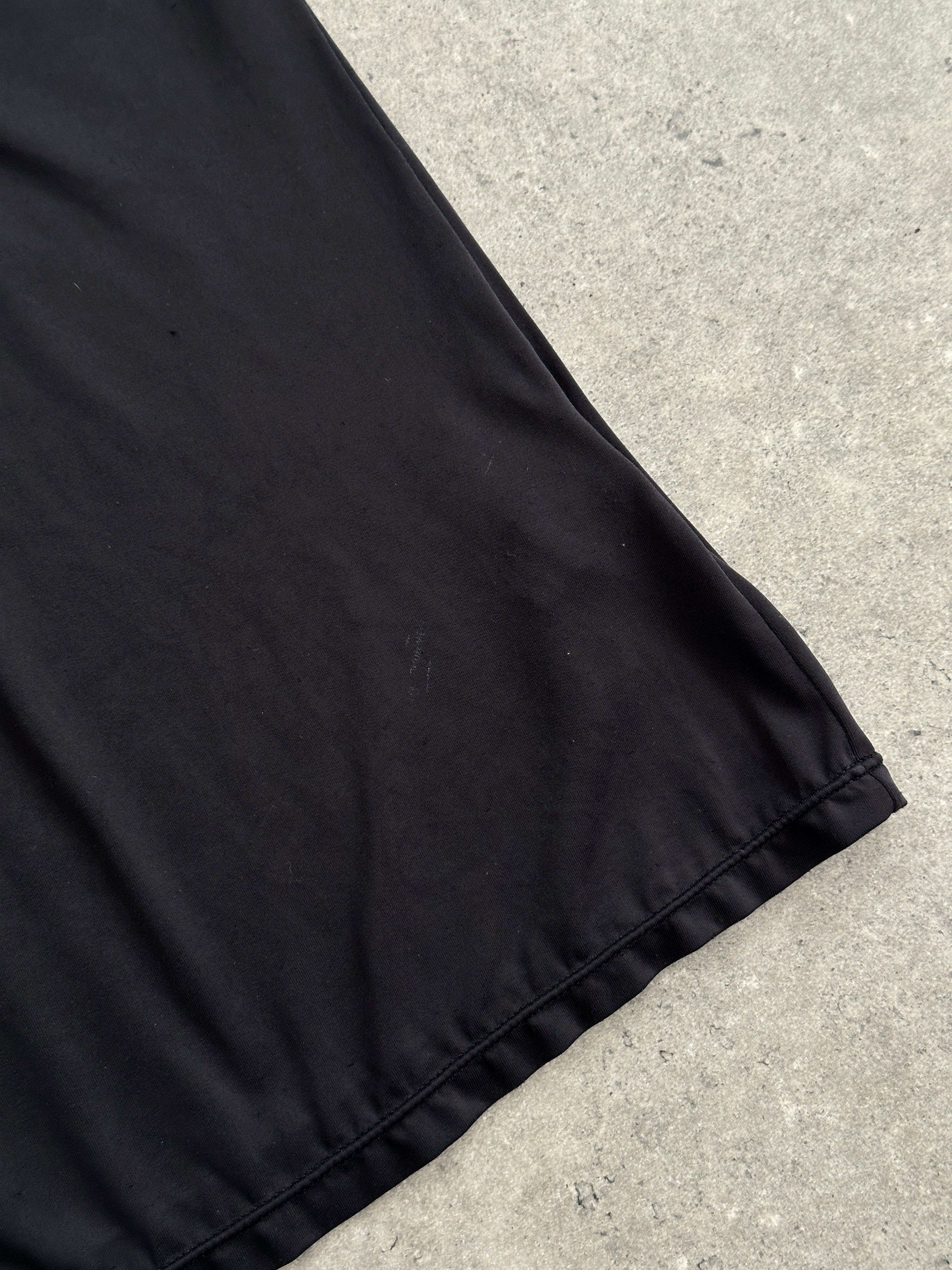 Dolce & Gabbana stretch cami top in XS/S, featuring a fitted design and sleek fabric, displayed on a neutral background.