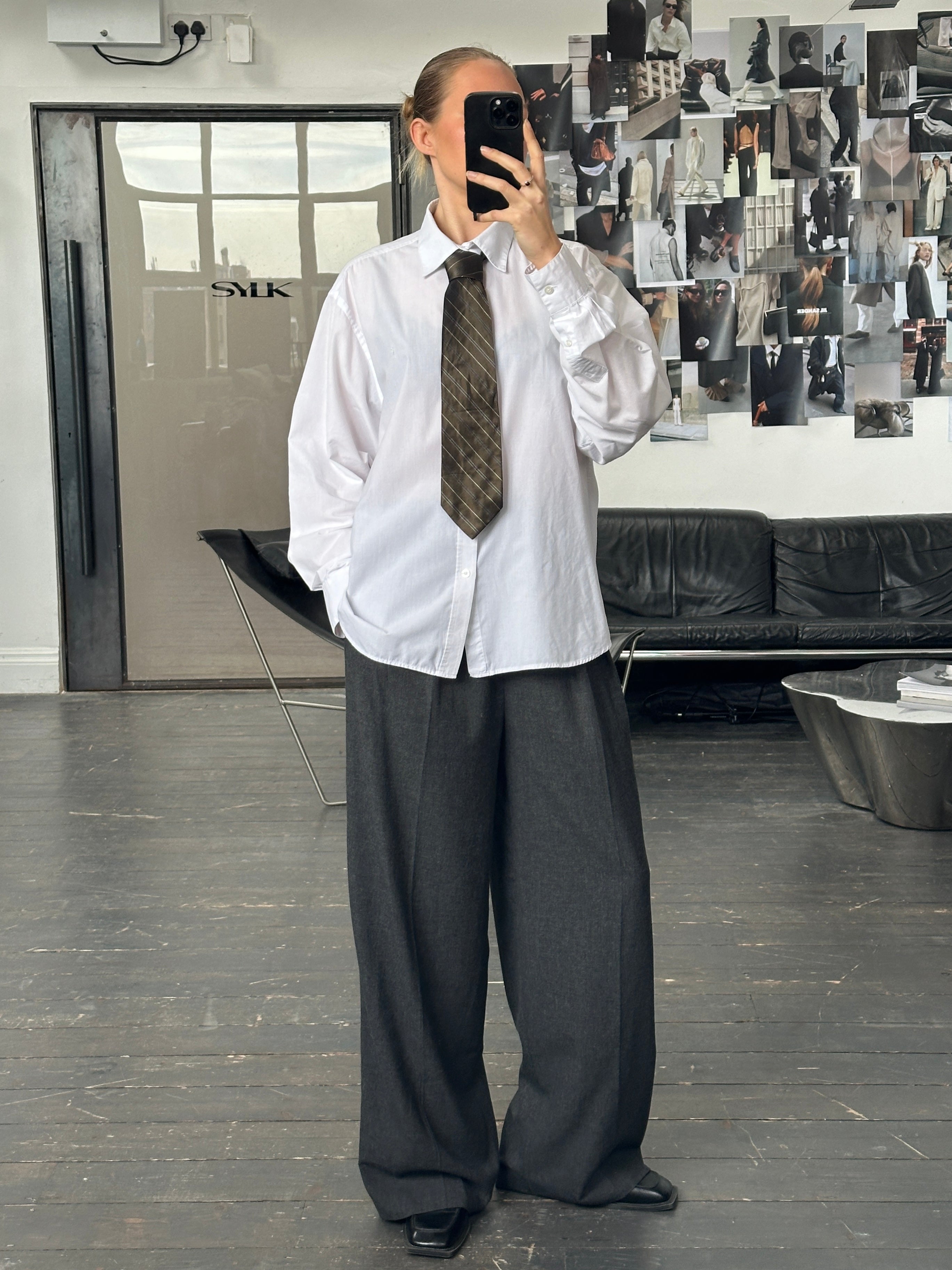 Trussardi 1990s pure silk diagonal stripe tie displayed with detailed close-up of the fabric and classic design.