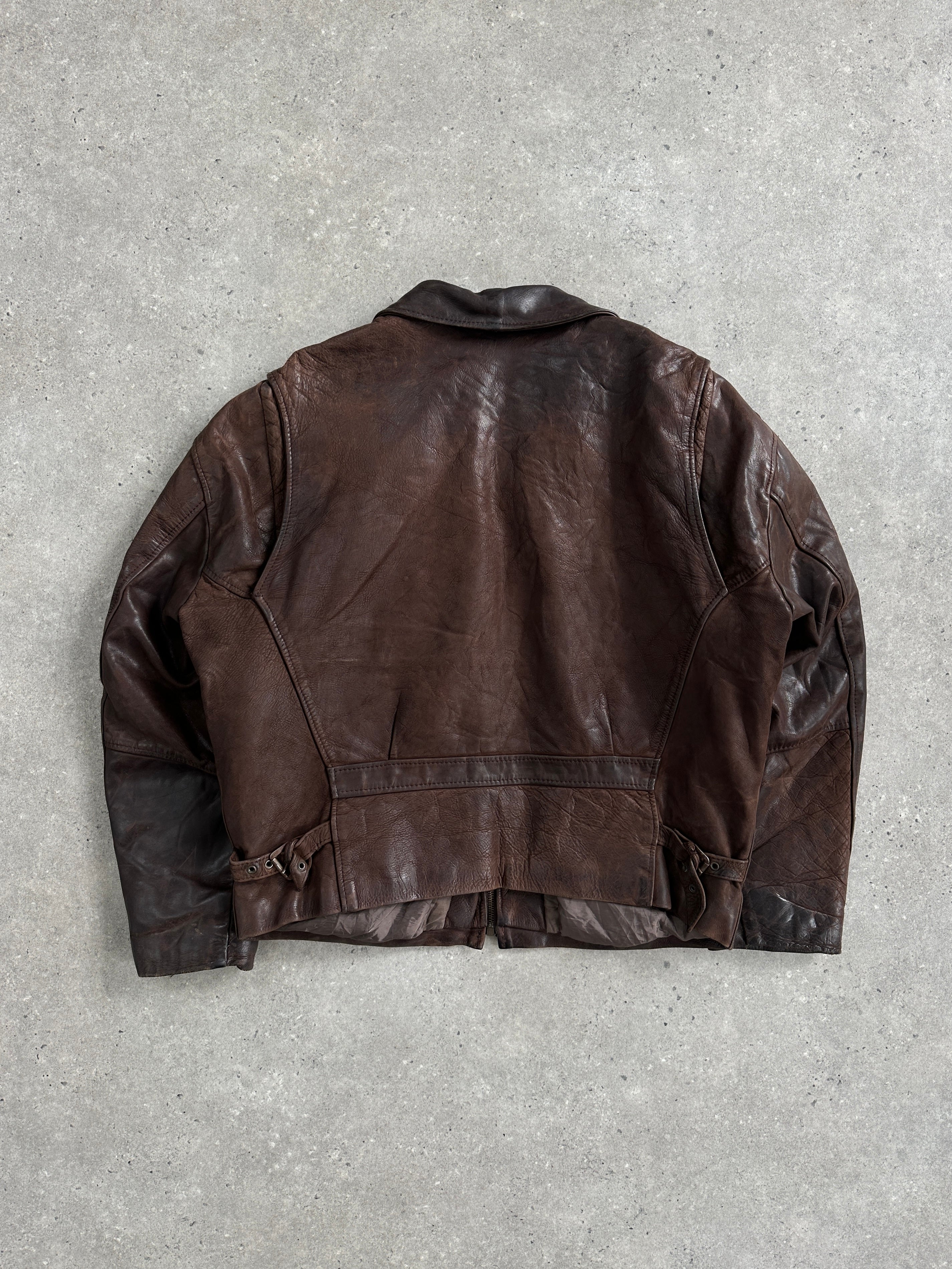 Vintage French 1980s aged boxy leather jacket, size L, featuring distressed leather and classic vintage style.