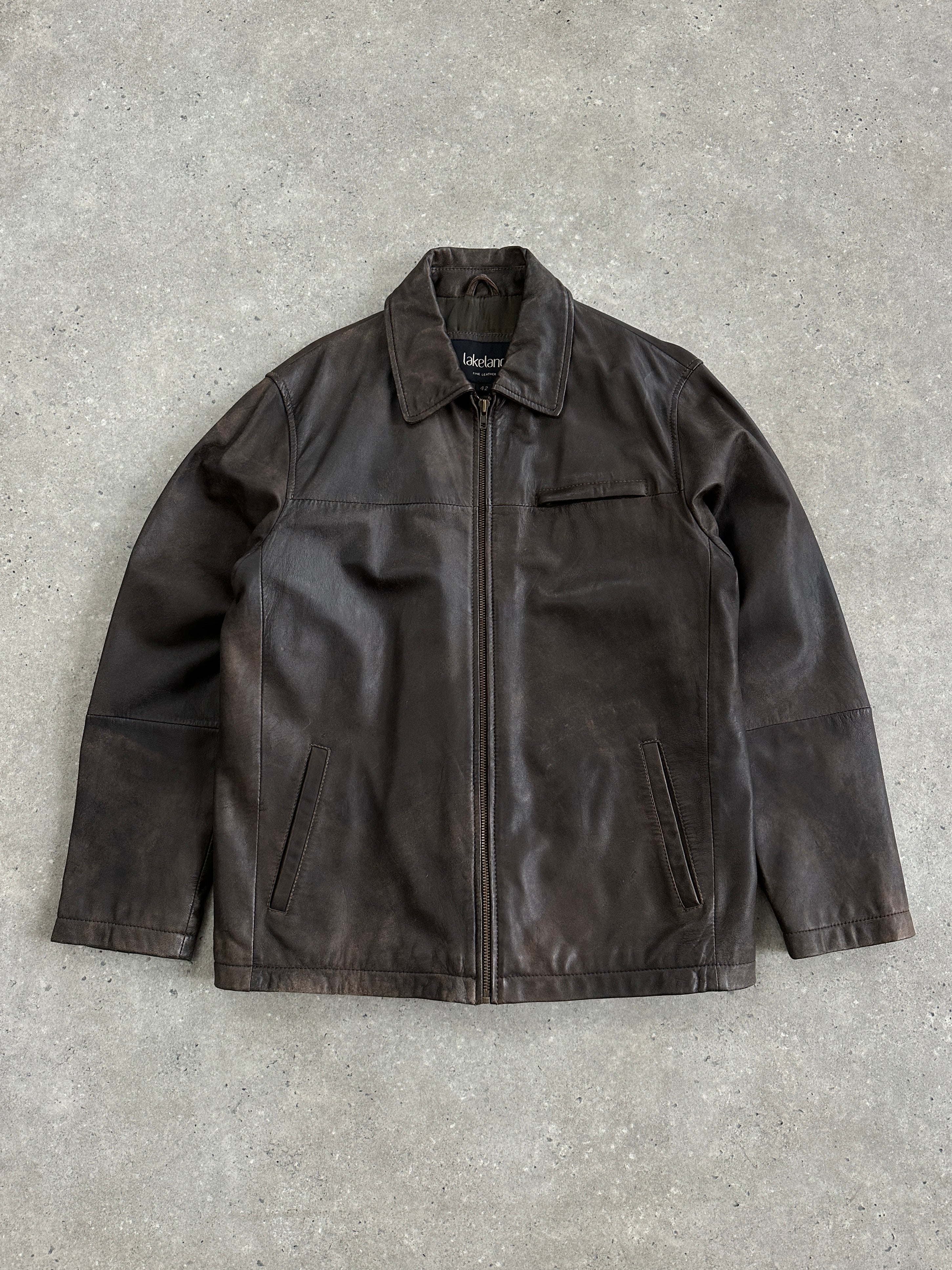 Vintage minimal aged leather jacket in XL size, featuring a classic design with distressed leather and a tailored fit.