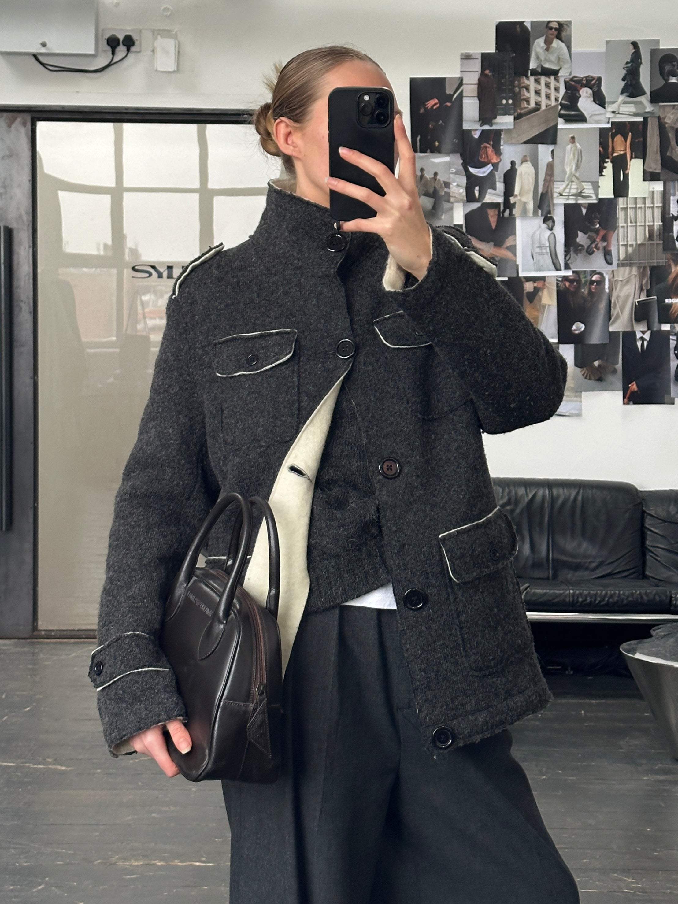 Vintage 1990s wool high neck utility jacket in size large, featuring a classic design with functional pockets and a cozy high collar.