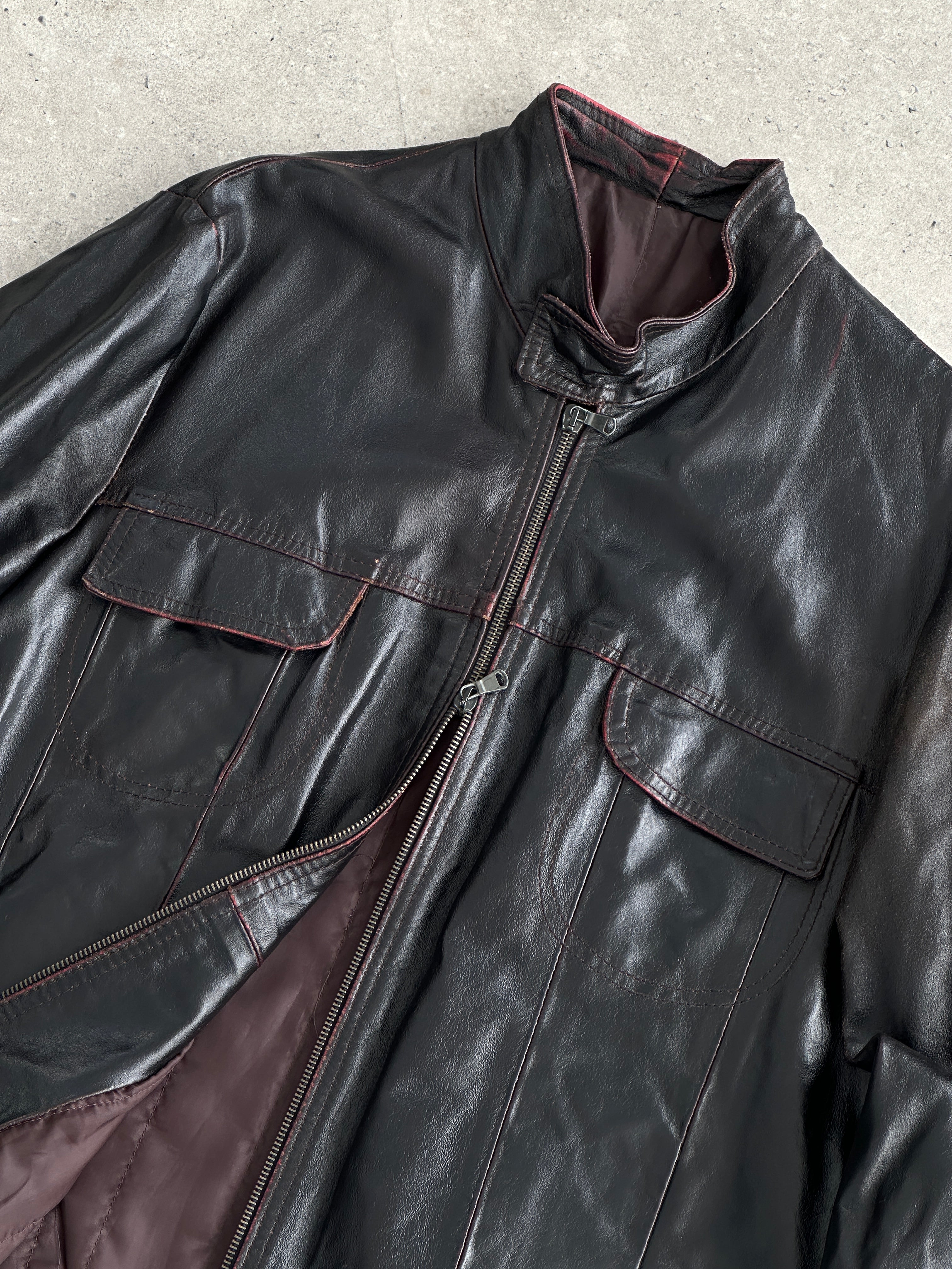 Vintage Italian distressed leather double zip jacket, size L/XL, with rugged style and worn-in details.