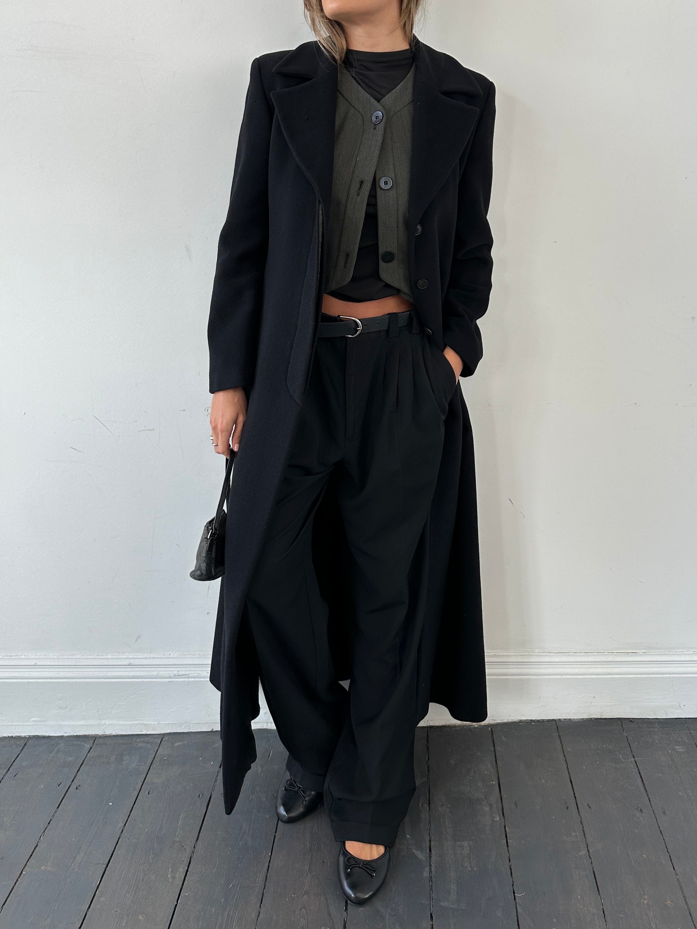 Emporio Armani A-line floor-length cashmere coat in black, featuring a classic collar and stylish silhouette.