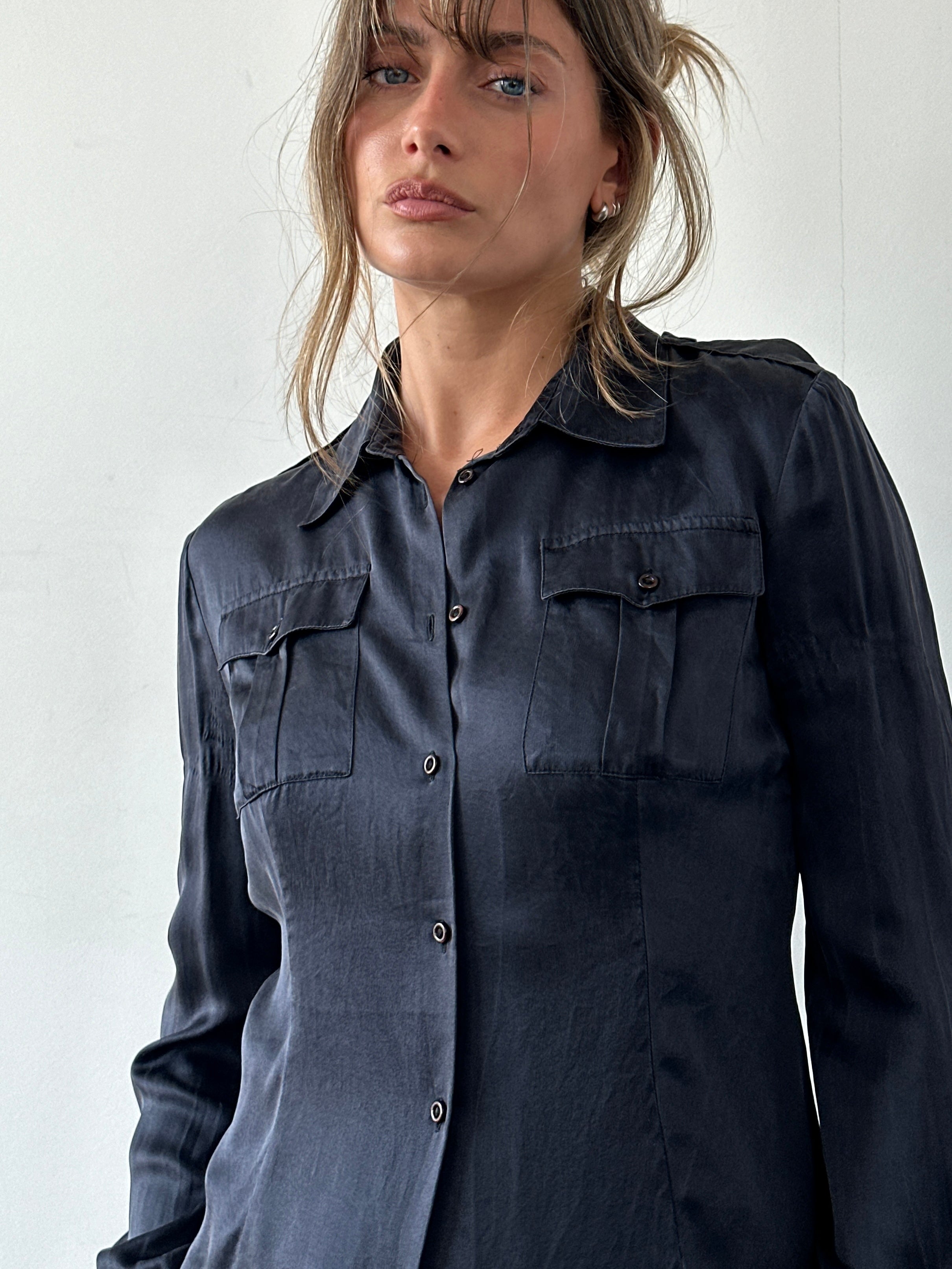 Italian Vintage pure silk fitted shirt in size S, featuring a classic design and smooth silk fabric, displayed on a mannequin.