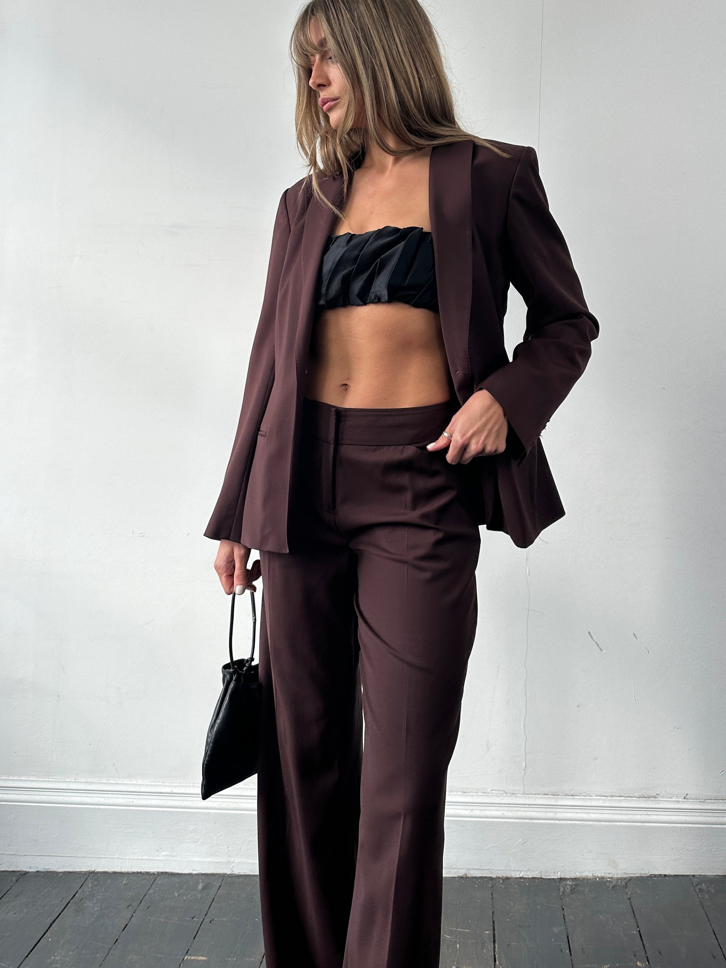 Max Studio wool wide-leg jumpsuit in beige with single-breasted blazer and matching wide-leg pants, styled for a modern professional look.
