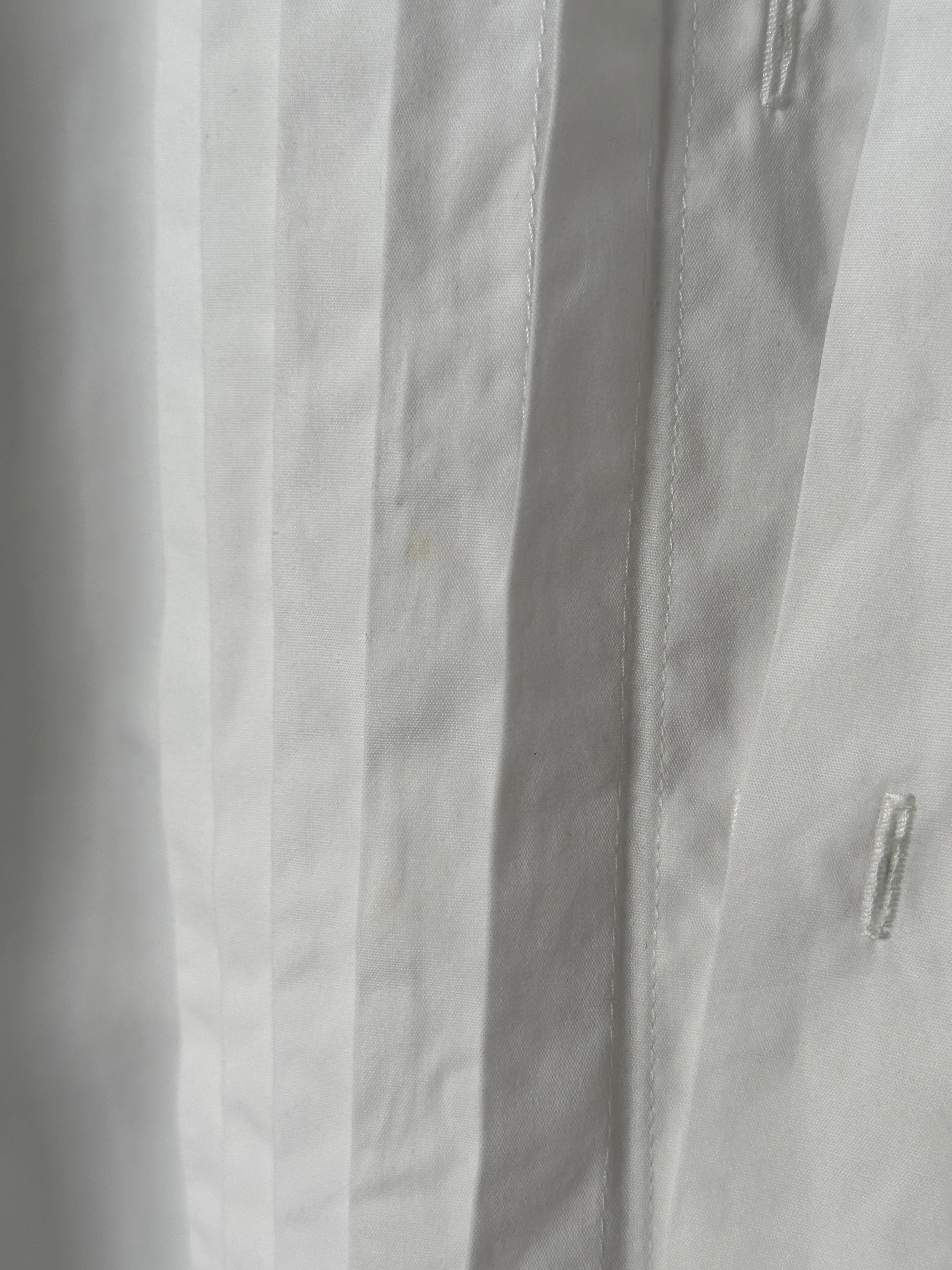 Christian Dior pleated tuxedo cotton shirt in size M, featuring a classic fit with elegant pleats and crisp white fabric.